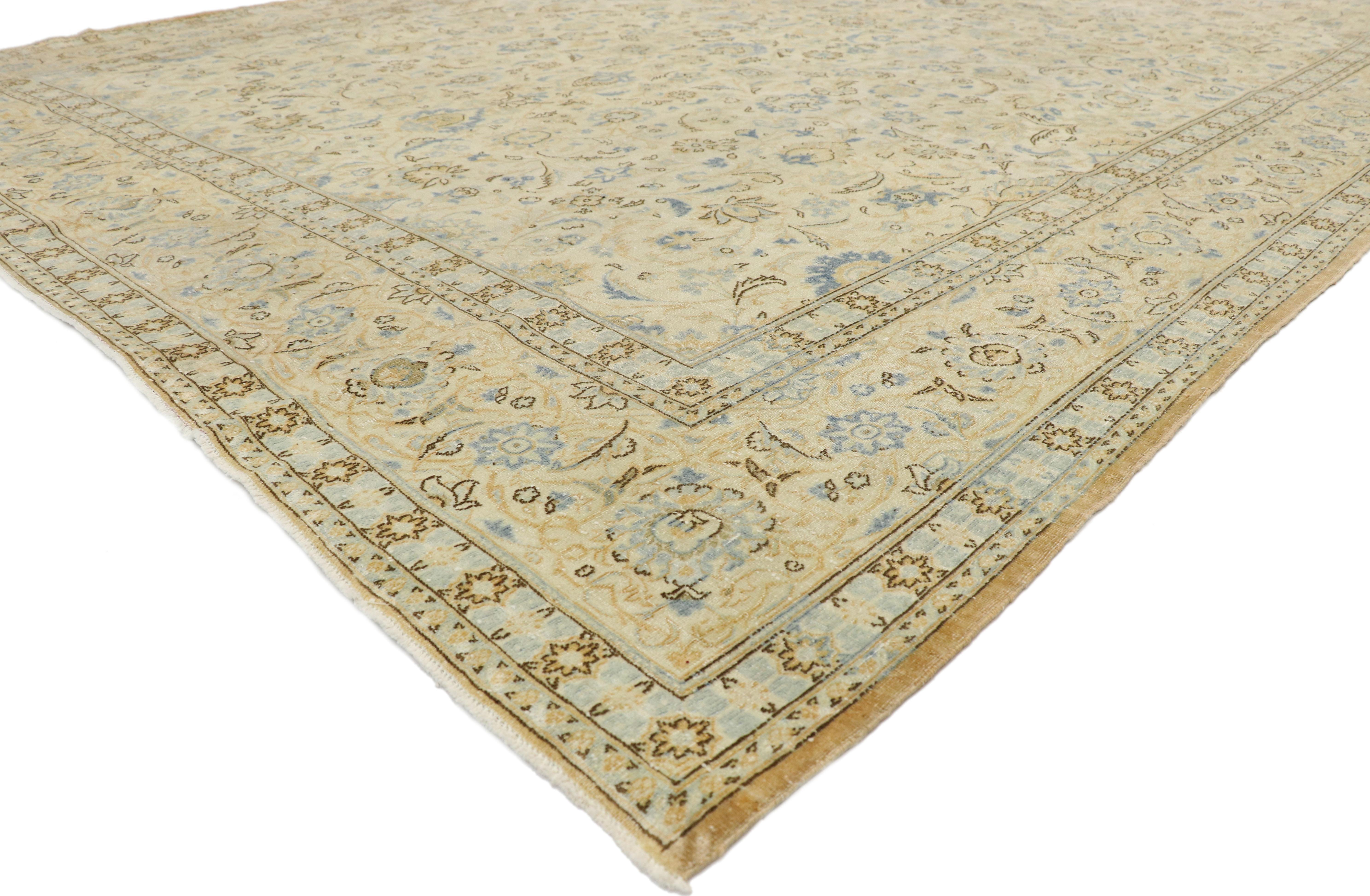 52843 Distressed Antique Persian Kashan Rug with Cotswold English Manor Style 08'07 x 12'08. With a timeless floral pattern and lovingly timeworn appearance, this hand knotted wool distressed antique Persian Kashan rug charms with ease and