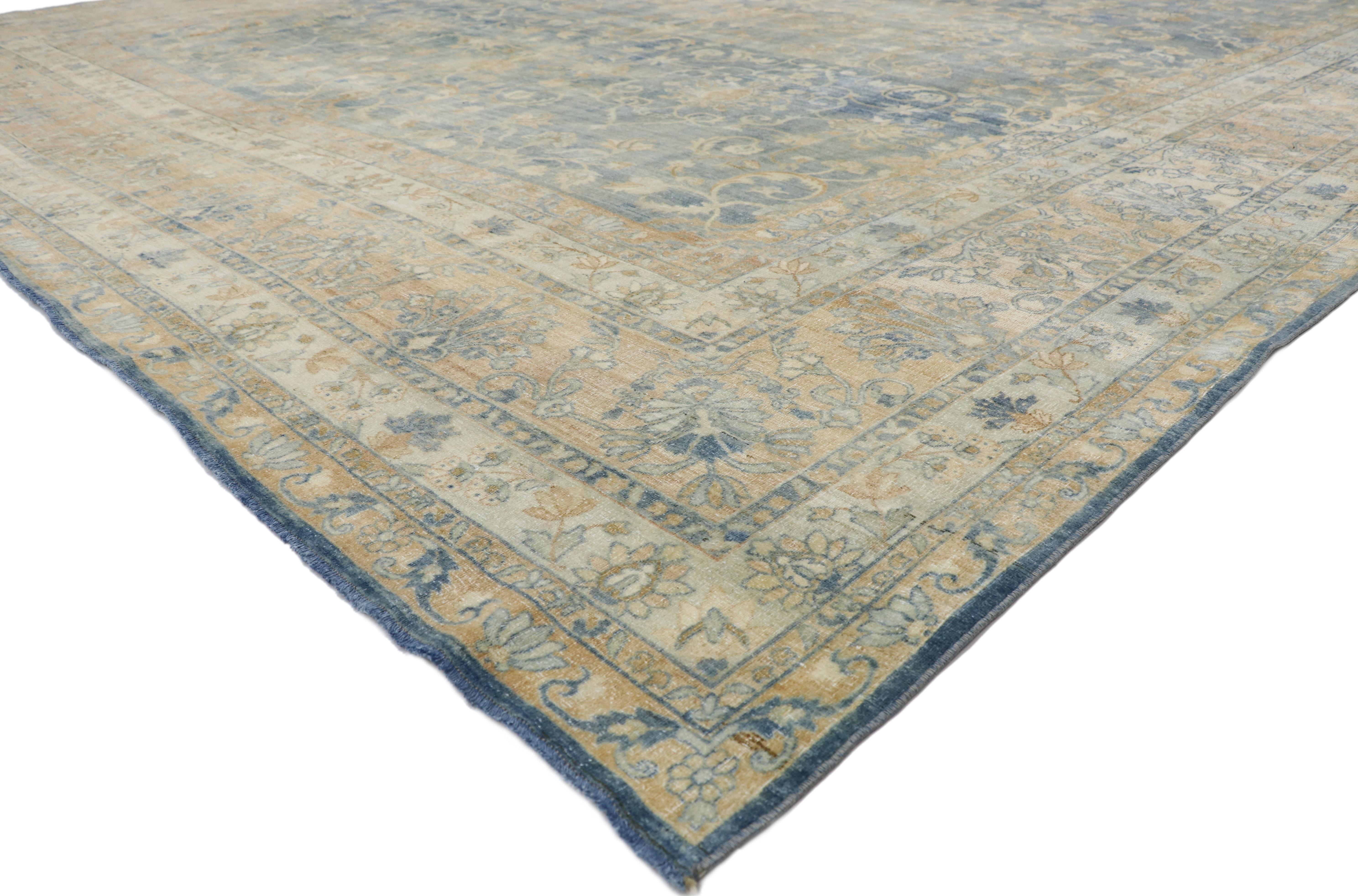 76737 Antique Persian Kerman Rug Hotel Lobby Size 11'09 x 18'07.
With its casual elegance and lovingly timeworn appearance combined with light and airy colors, this hand knotted wool distressed antique Persian Kerman palace rug charms with ease and