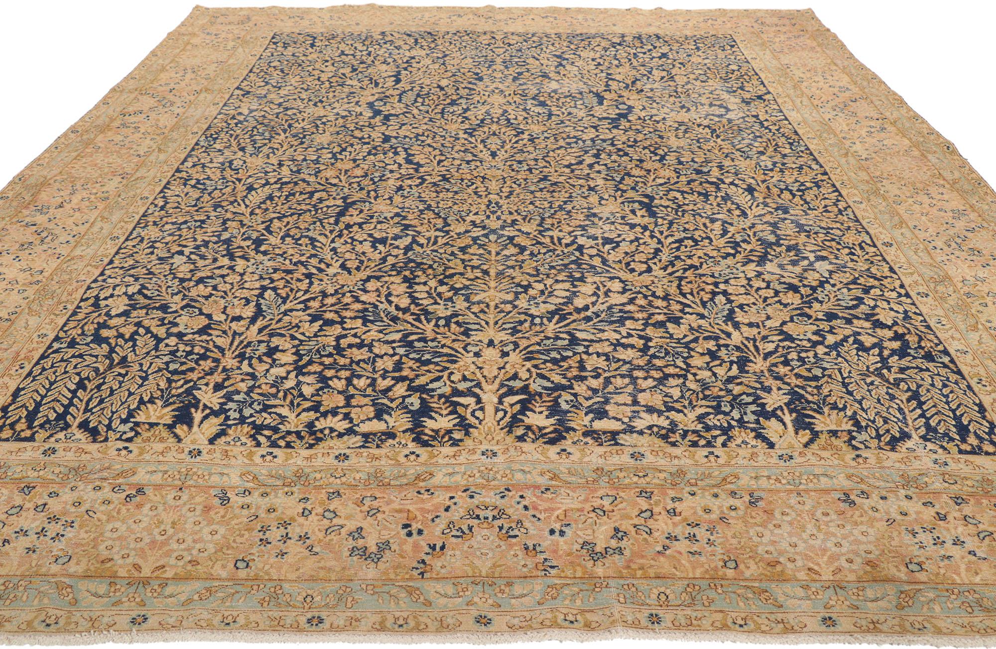 Kirman Distressed Antique Persian Kerman Rug with Millefleur Design For Sale