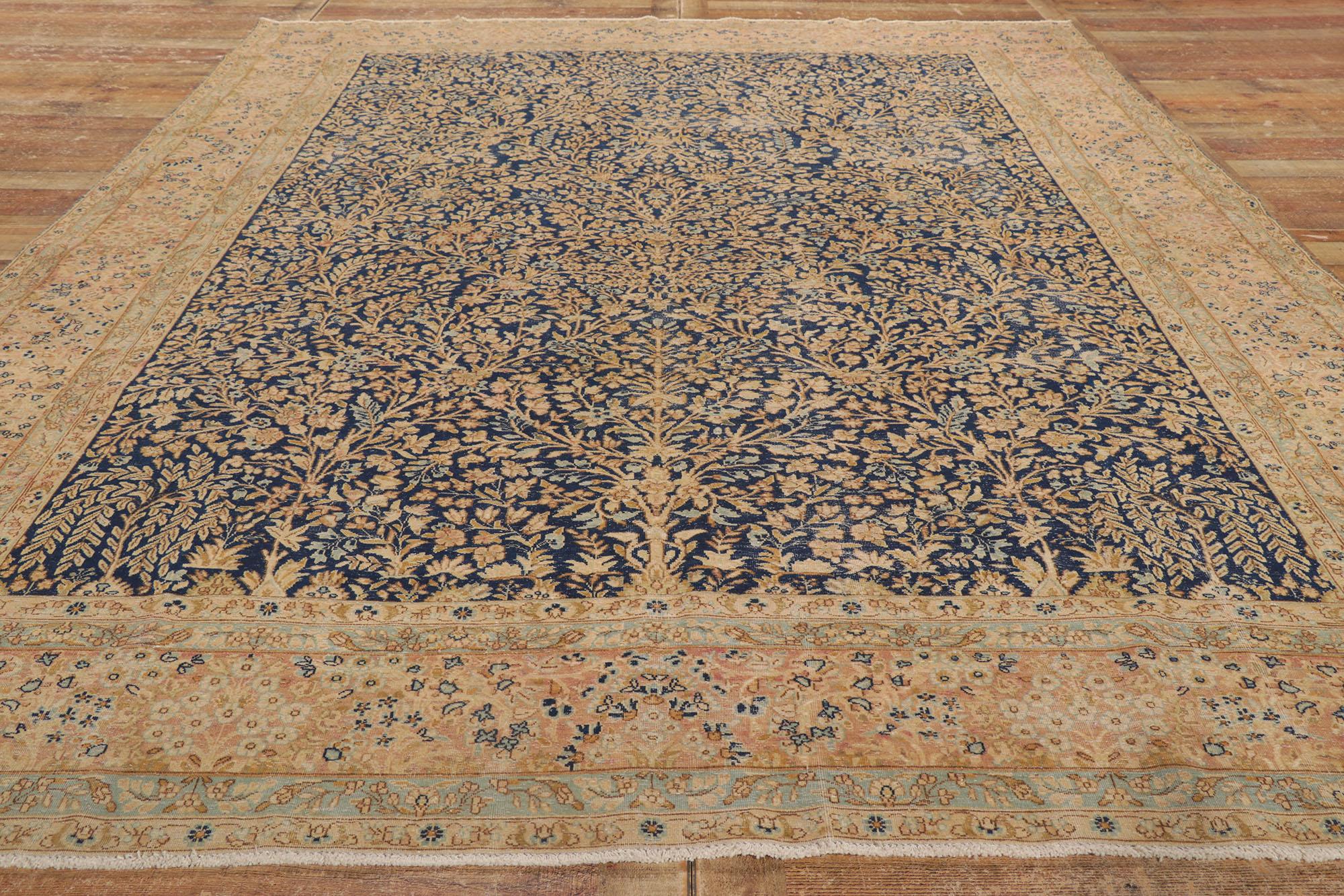 Wool Distressed Antique Persian Kerman Rug with Millefleur Design For Sale