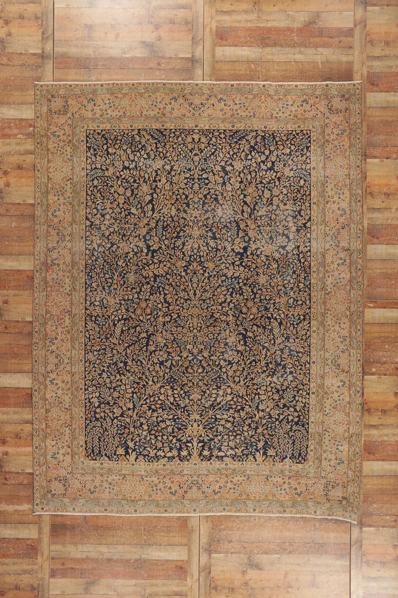 Distressed Antique Persian Kerman Rug with Millefleur Design For Sale 1