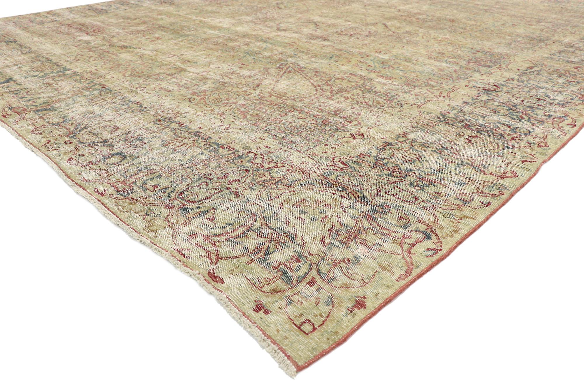51525, distressed antique Persian Kerman rug with modern Rustic English cottage style. Balancing a timeless floral design with traditional sensibility and a lovingly timeworn patina, this hand knotted wool distressed antique Persian Kerman rug