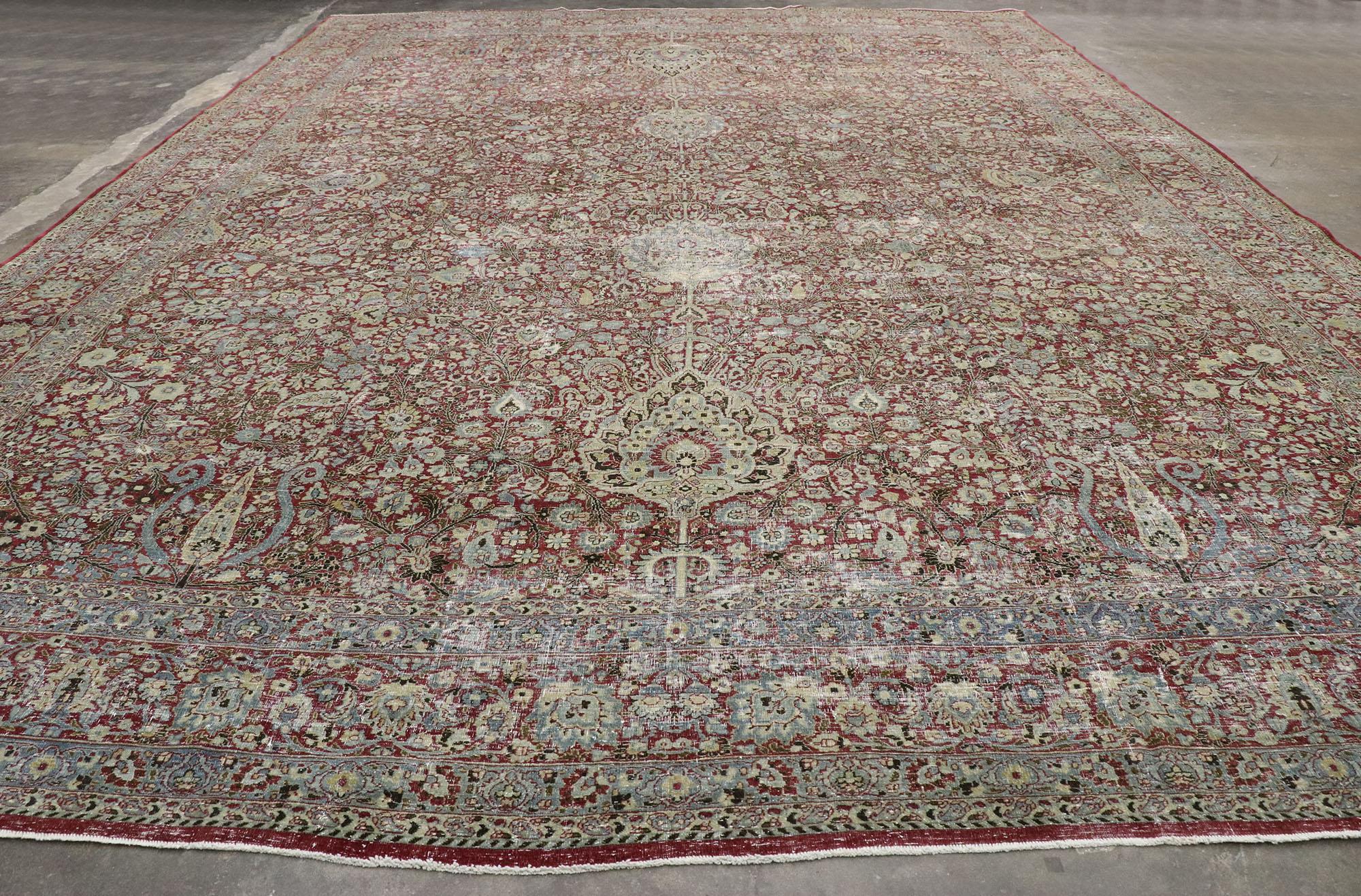 Distressed Antique Persian Kerman Rug, Laid-Back Luxury Meets Rugged Beauty For Sale 1