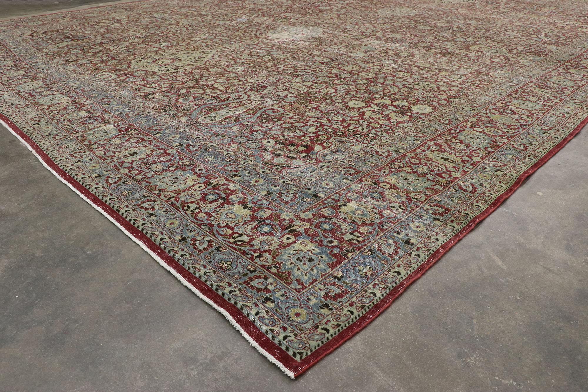 Wool Distressed Antique Persian Kerman Rug, Laid-Back Luxury Meets Rugged Beauty For Sale