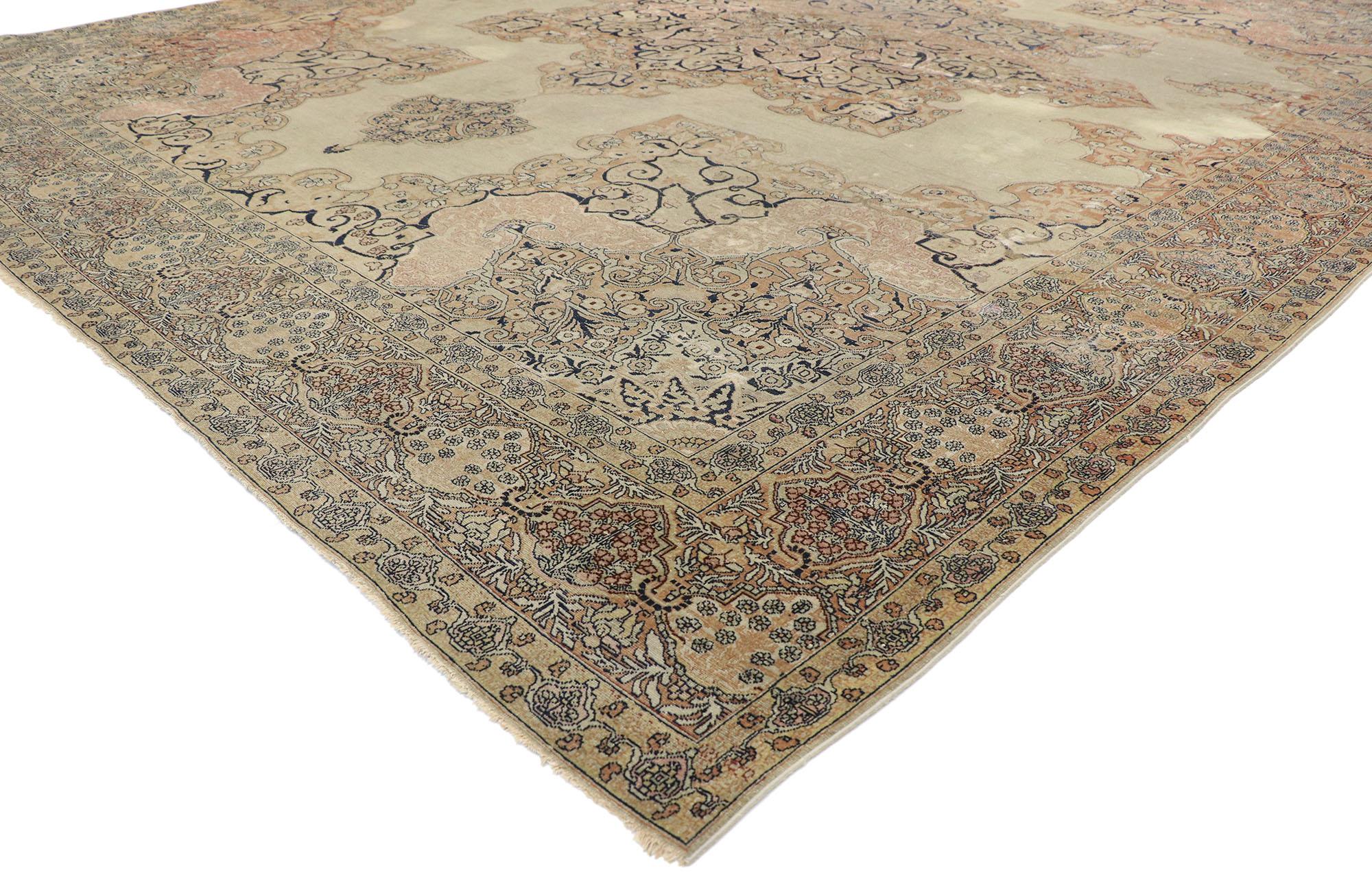 77627 Distressed Antique Persian Kerman rug with relaxed French Provincial style. Cleverly composed with rustic sensibility and a hint of romantic connotations, this hand knotted wool distressed antique Persian Kerman rug will take on a curated