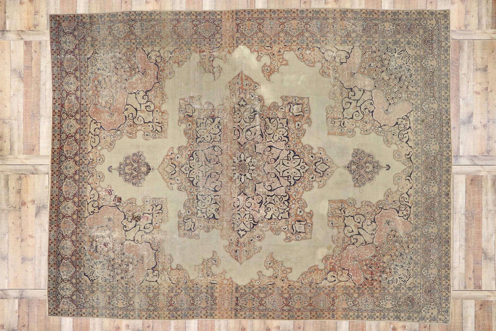 Wool Distressed Antique Persian Kerman Rug with Relaxed French Provincial Style For Sale