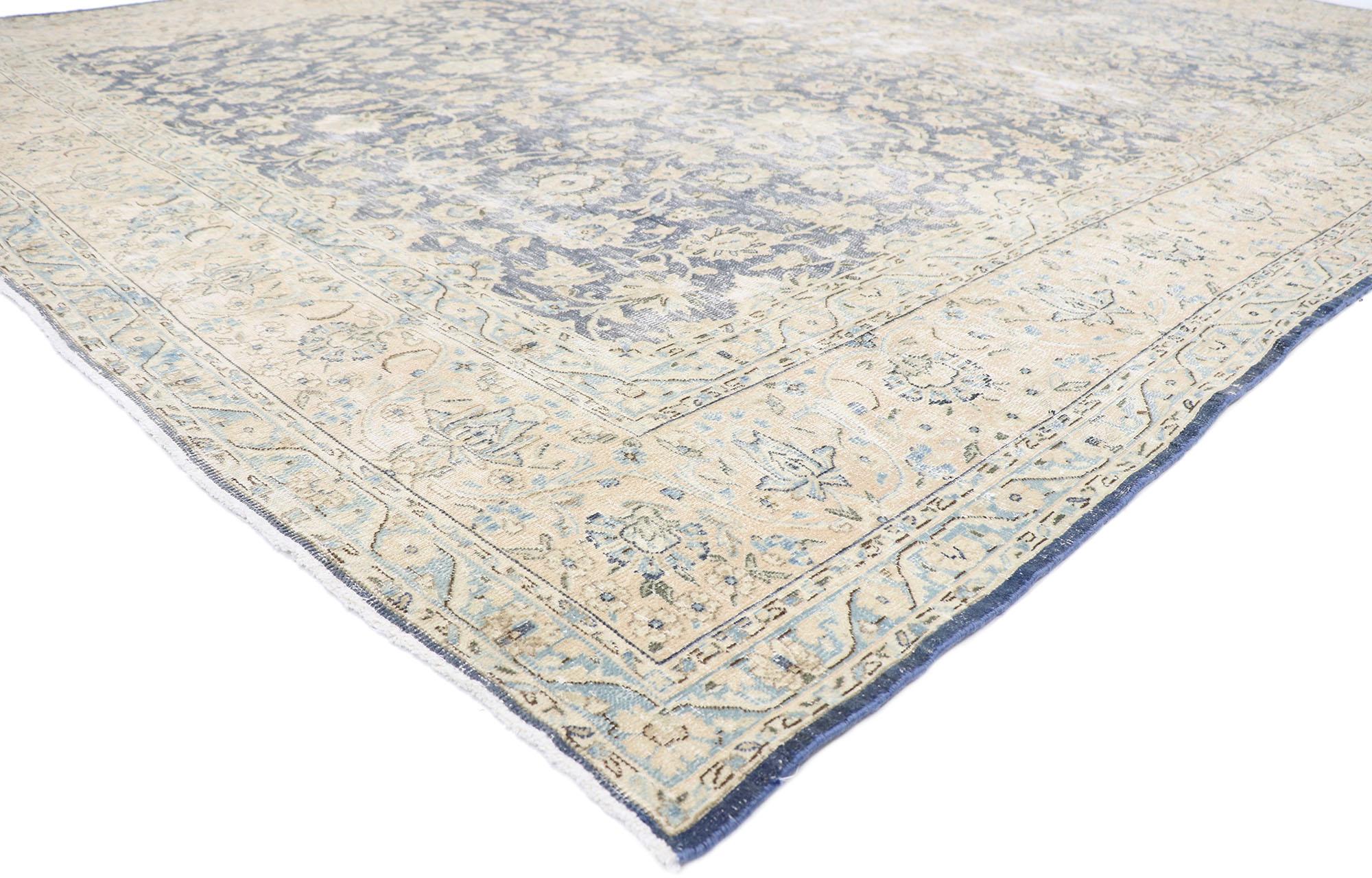 60896 distressed antique Persian Kerman rug with Rustic French Cottage style 10'04 x 13'08. With its perfectly worn-in charm and rustic sensibility, this hand-knotted wool distressed antique Persian Kerman rug will take on a curated lived-in look