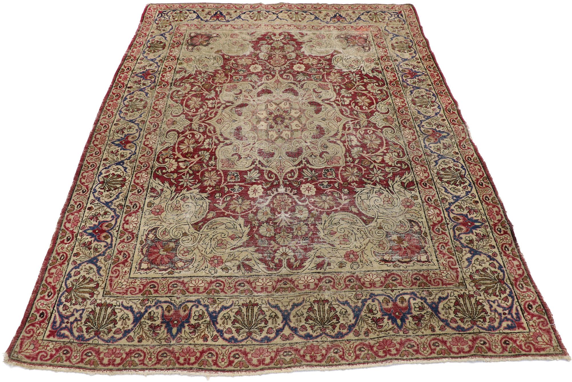 Kirman Distressed Antique Persian Kerman Rug with Rustic Old World Victorian Style For Sale