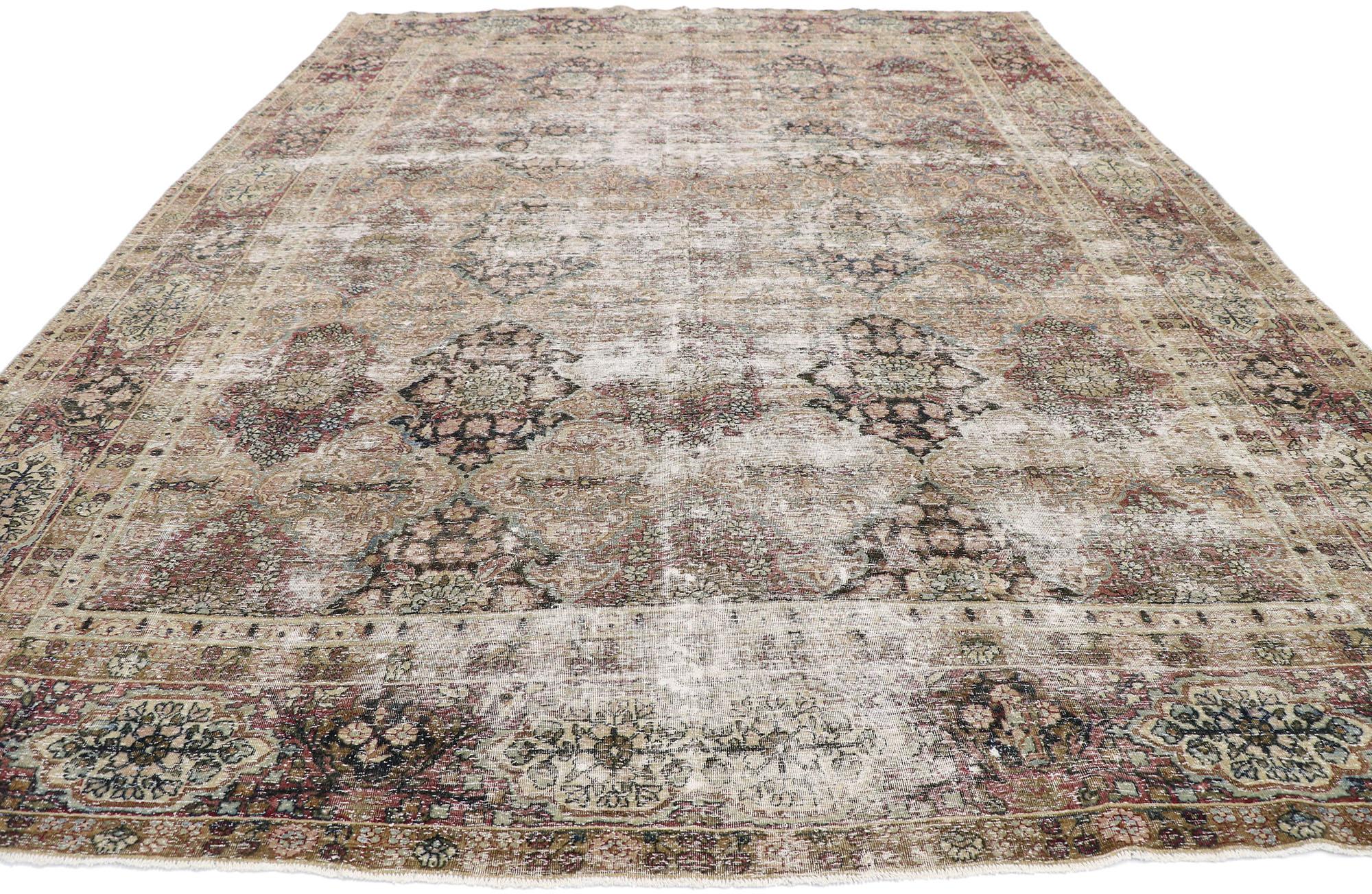 Kirman Distressed Antique Persian Kerman Rug with Rustic Renaissance Style For Sale