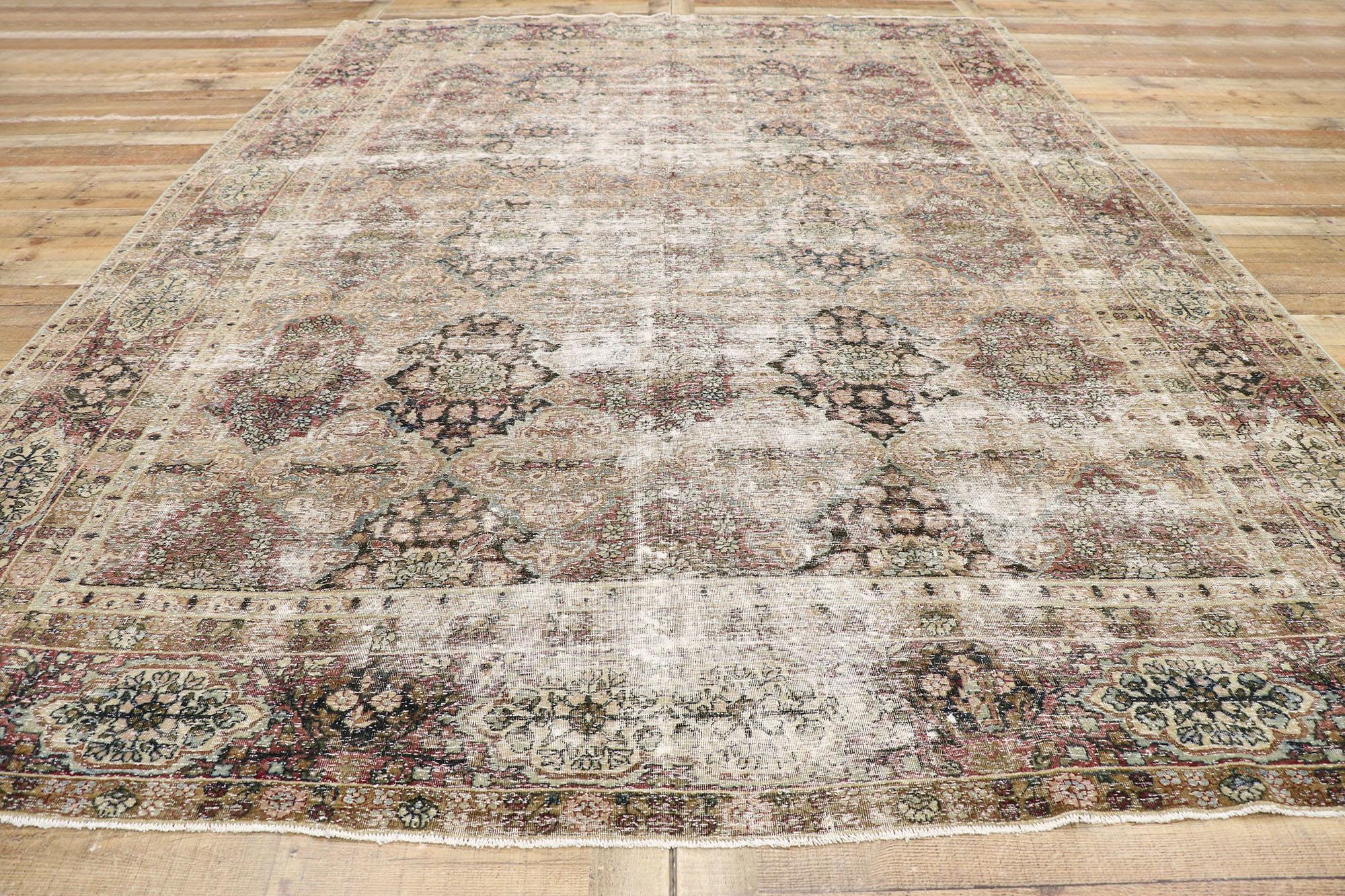 Wool Distressed Antique Persian Kerman Rug with Rustic Renaissance Style For Sale