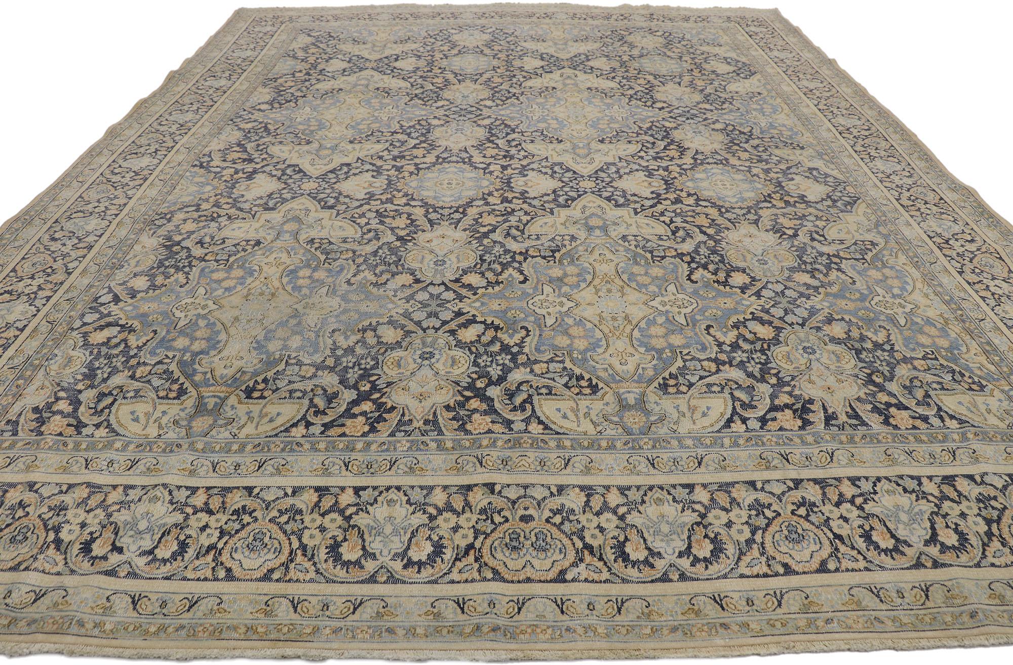 Kirman Distressed Antique Persian Kerman Rug with Rustic Style For Sale