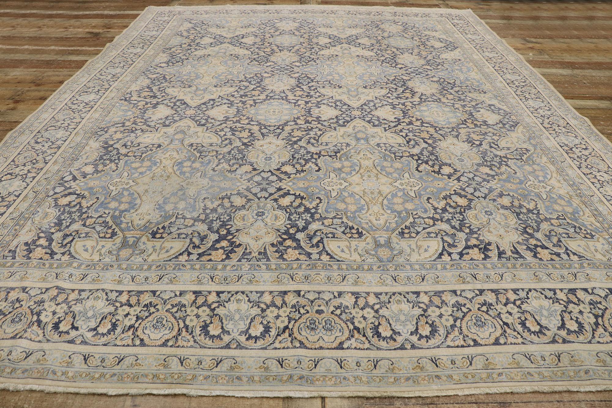 Wool Distressed Antique Persian Kerman Rug with Rustic Style For Sale