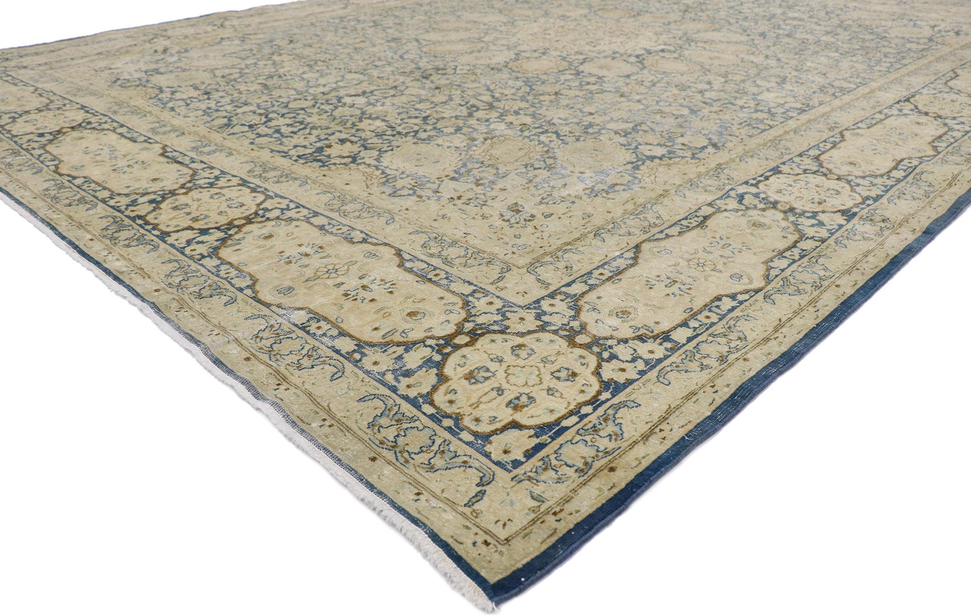 60936 distressed antique Persian Kerman rug with The Ardabil Carpet design 09'10 x 13'02. Effortlessly chic and emanating coastal vibes with rustic sensibility, this hand-knotted wool distressed antique Persian Kerman rug is a captivating vision of