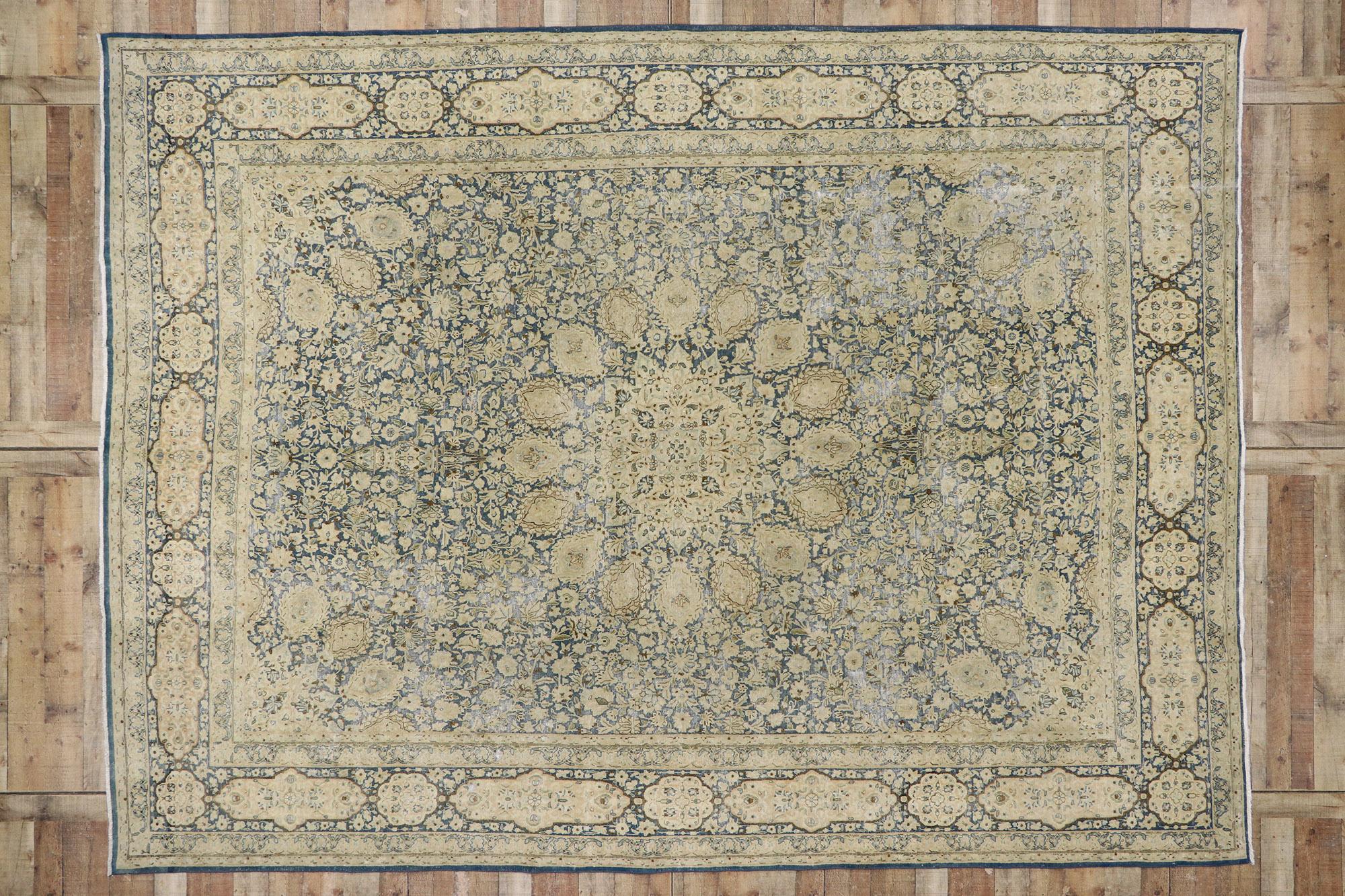 20th Century Distressed Antique Persian Kerman Rug with the Ardabil Carpet Design For Sale