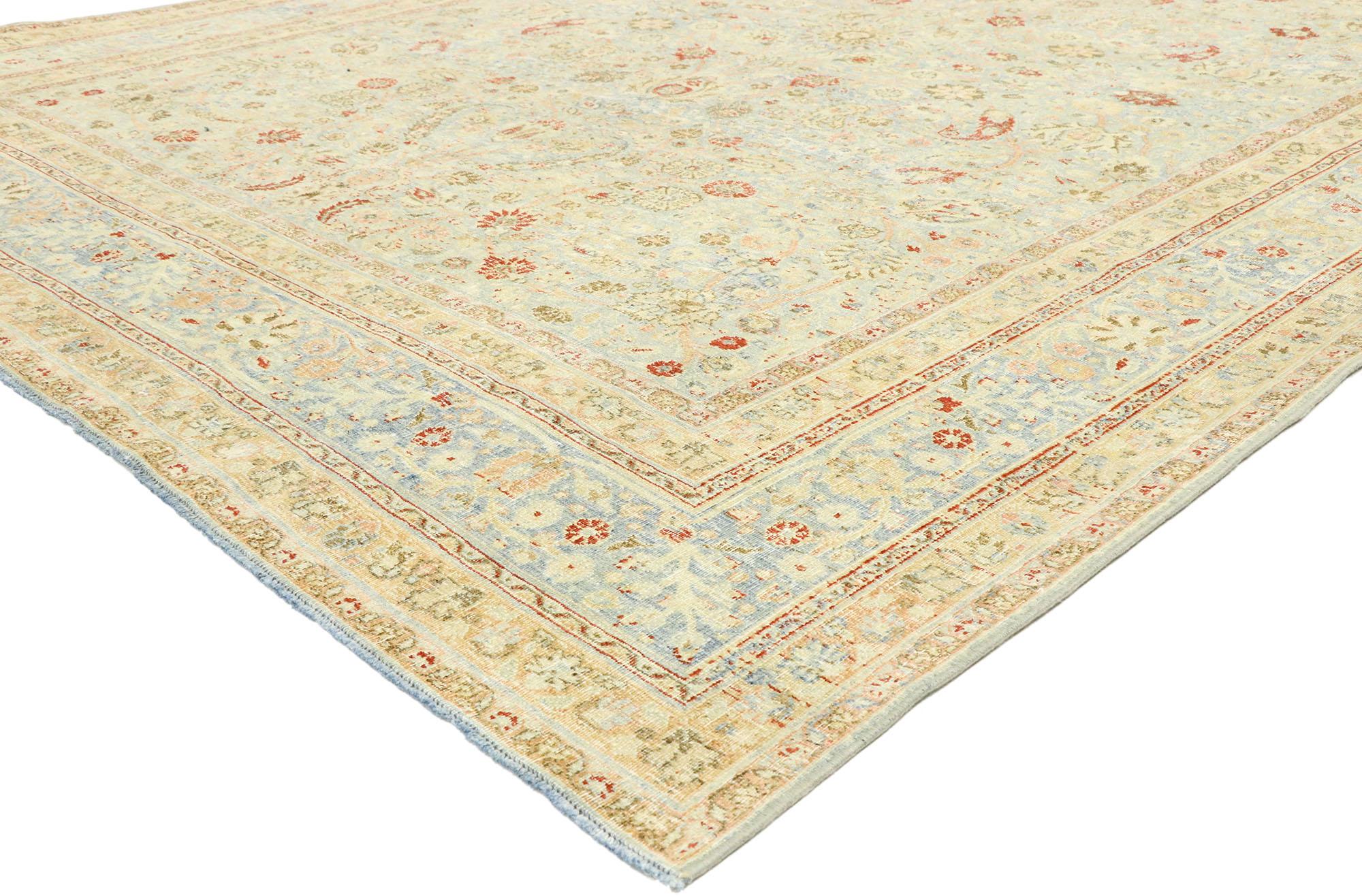 53036, distressed antique Persian Khorassan rug with Rustic English Manor style. With a timeless floral pattern and lovingly timeworn appearance, this hand knotted wool distressed antique Persian Khorassan rug beautifully embodies rustic English