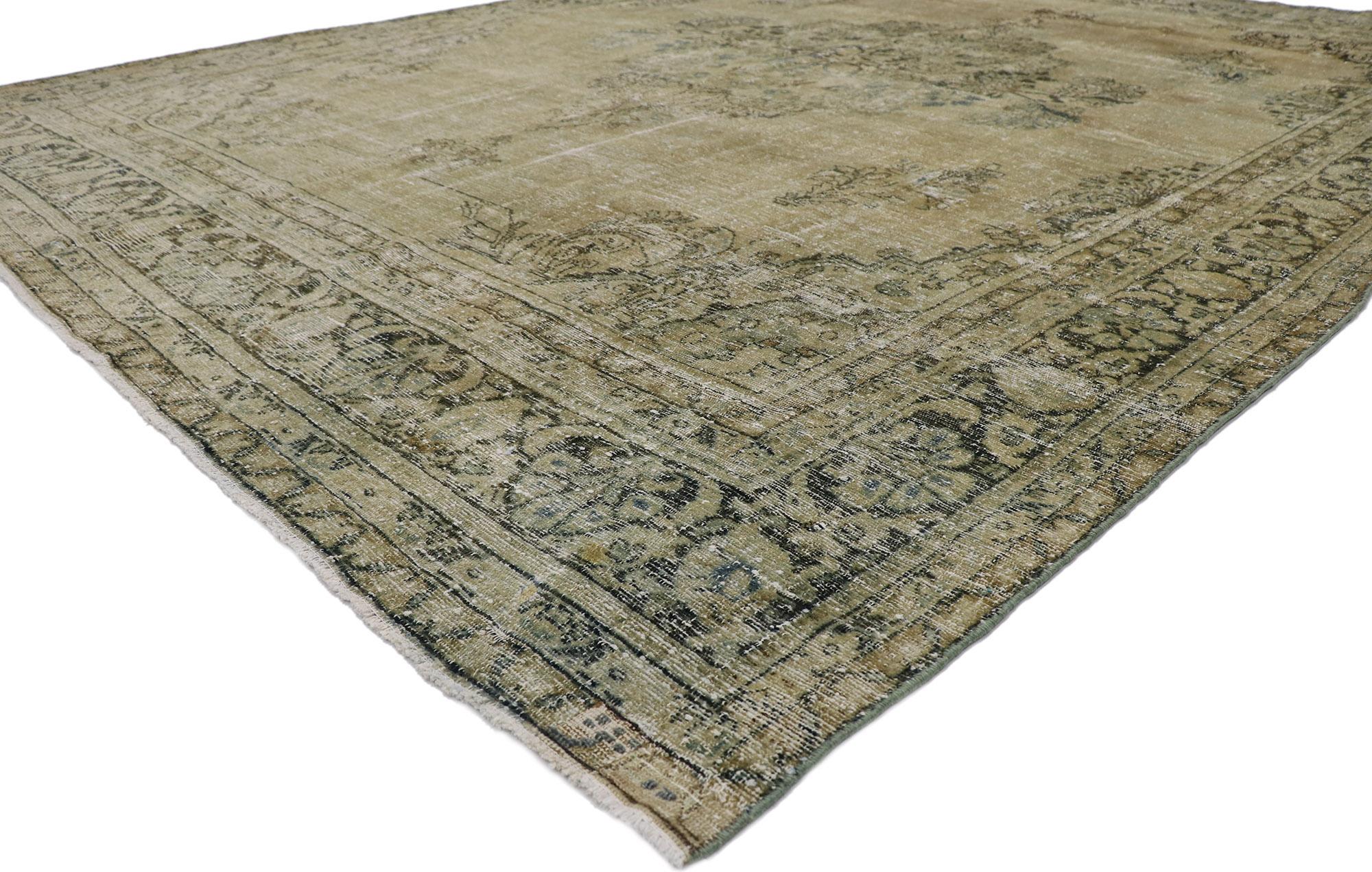 60929 Distressed Antique Persian Mahal Rug 09'06 x 12'04. Warm and inviting with rustic sensibility, this hand-knotted wool distressed antique Persian Mahal is a captivating vision of woven beauty. The weathered brown field features a botanical