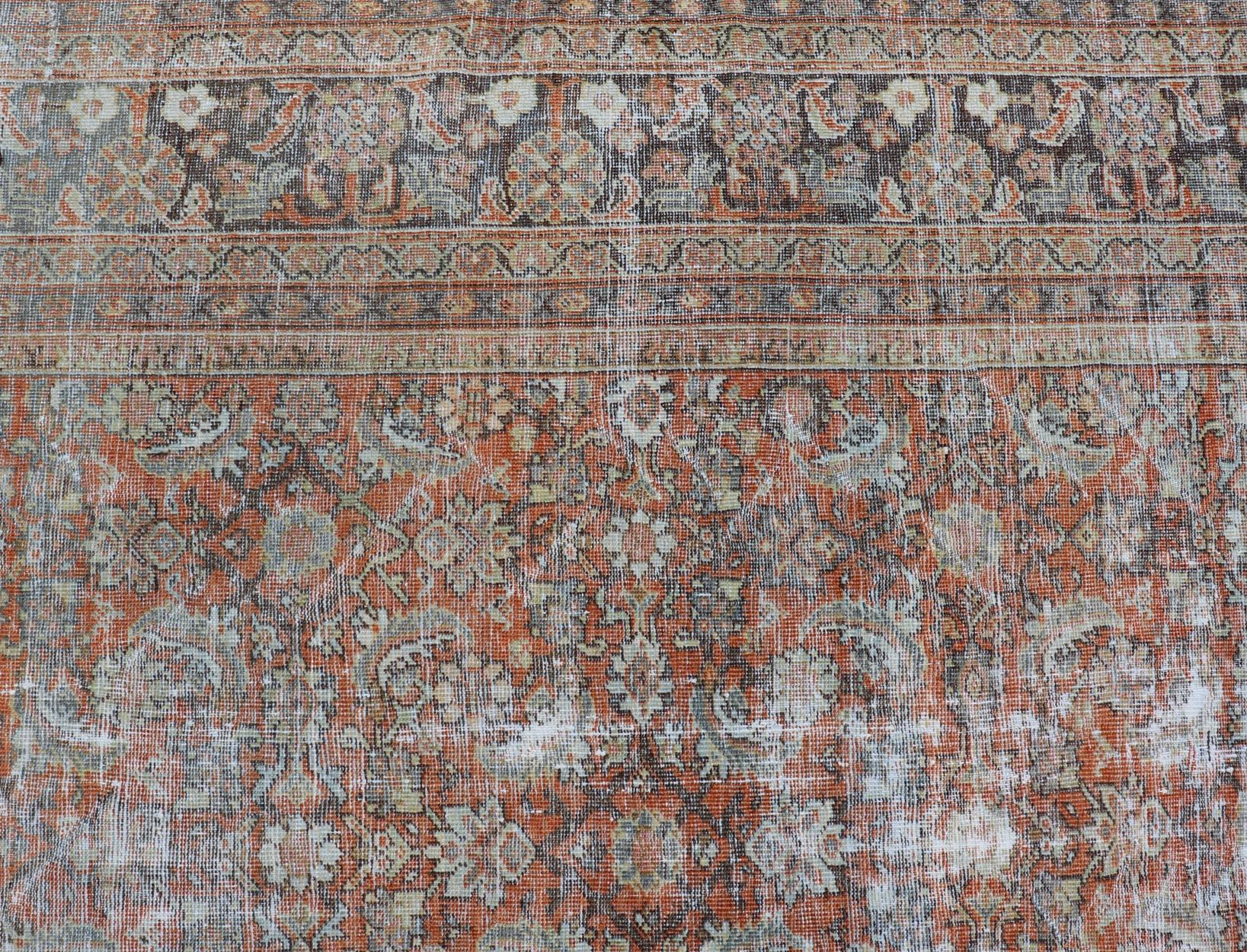 Distressed Antique Persian Mahal Rug in Wool with Floral Design on a Red Field For Sale 10