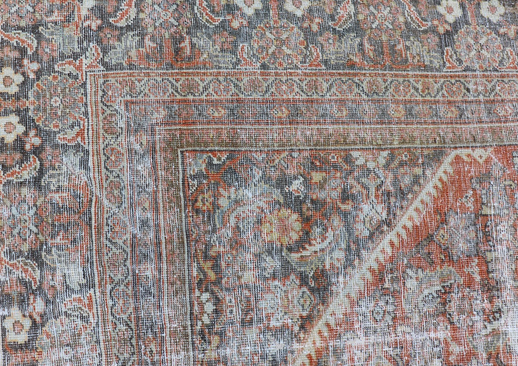 Distressed Antique Persian Mahal Rug in Wool with Floral Design on a Red Field For Sale 11
