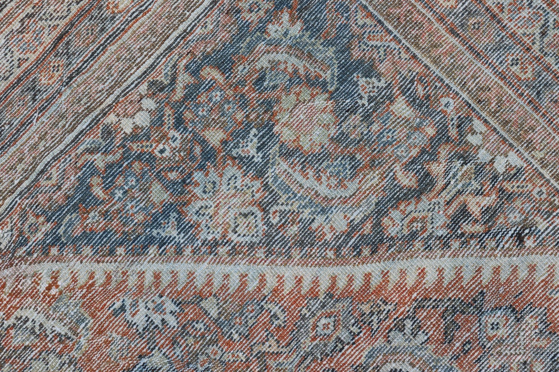 Distressed Antique Persian Mahal Rug in Wool with Floral Design on a Red Field For Sale 3
