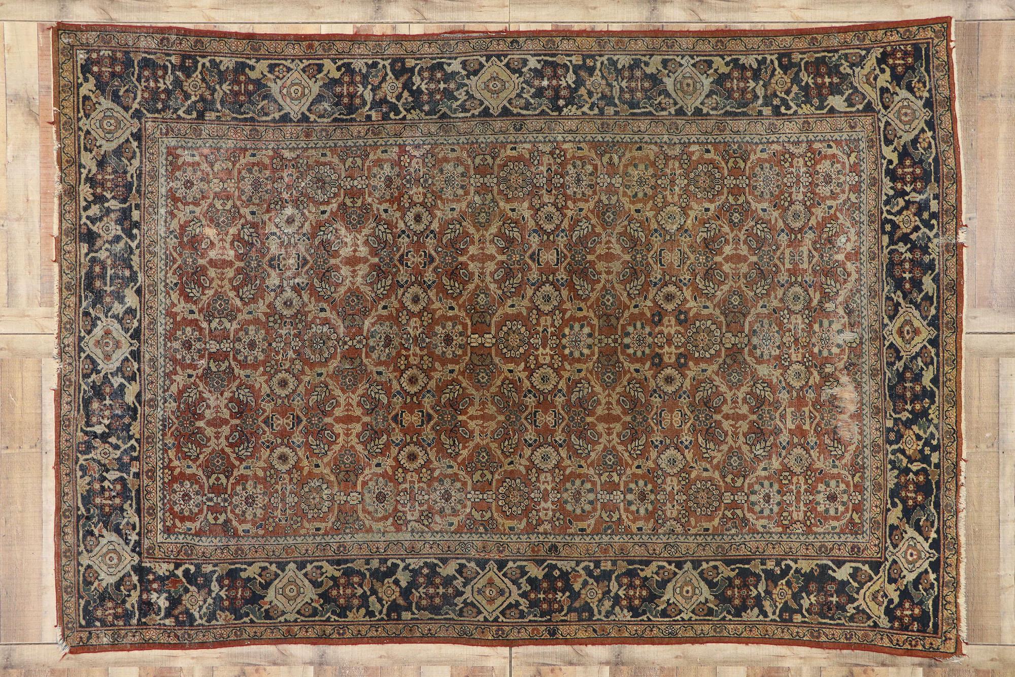 77572 distressed antique Persian Mahal rug with Modern Rustic English style 08'02 x 11'08. With its perfectly worn-in charm and rustic sensibility, this hand knotted wool distressed antique Persian Mahal rug will take on a curated lived-in look that