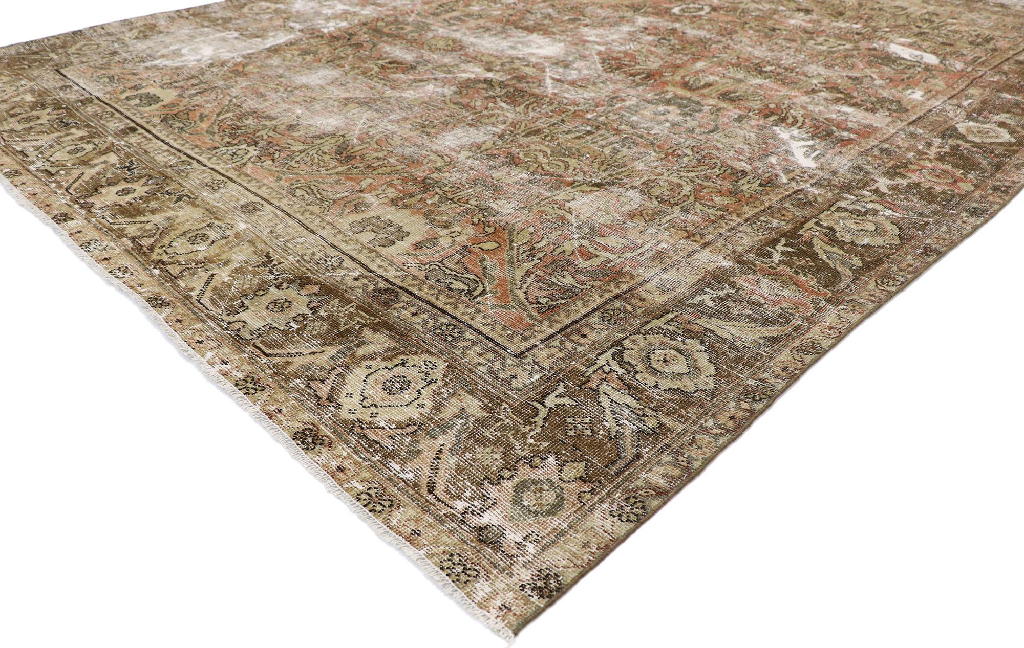 60829 distressed antique Persian Mahal rug with Modern Rustic style. With ornate details and a lovingly time-worn composition, this hand knotted wool distressed antique Persian Mahal rug is poised to impress. The weathered field features an all-over