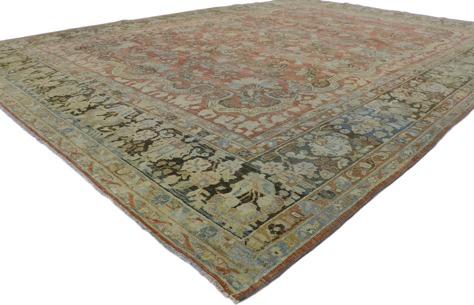53629 Distressed Antique Persian Mahal rug with Modern Rustic Style 08'07 x 11'10. With ornate details and a lovingly time-worn composition, this hand knotted wool distressed antique Persian Mahal rug is poised to impress. The weathered brick red