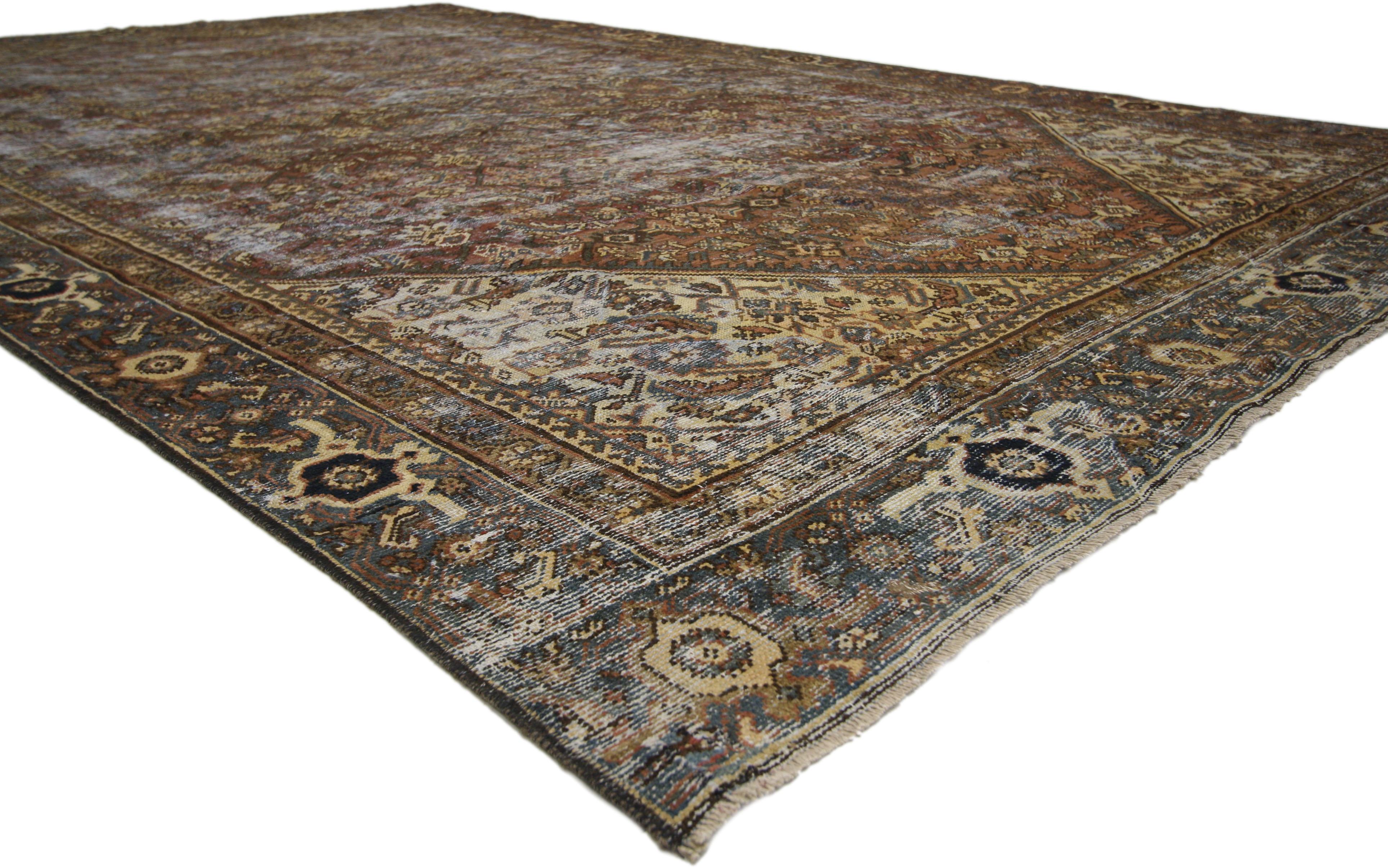 60673 Distressed Antique Persian Mahal Rug with Traditional English Rustic Style 08'04 x 12'07. With its perfectly worn-in charm and rustic sensibility, this hand-knotted wool distressed antique Persian Mahal rug will take on a curated lived-in look