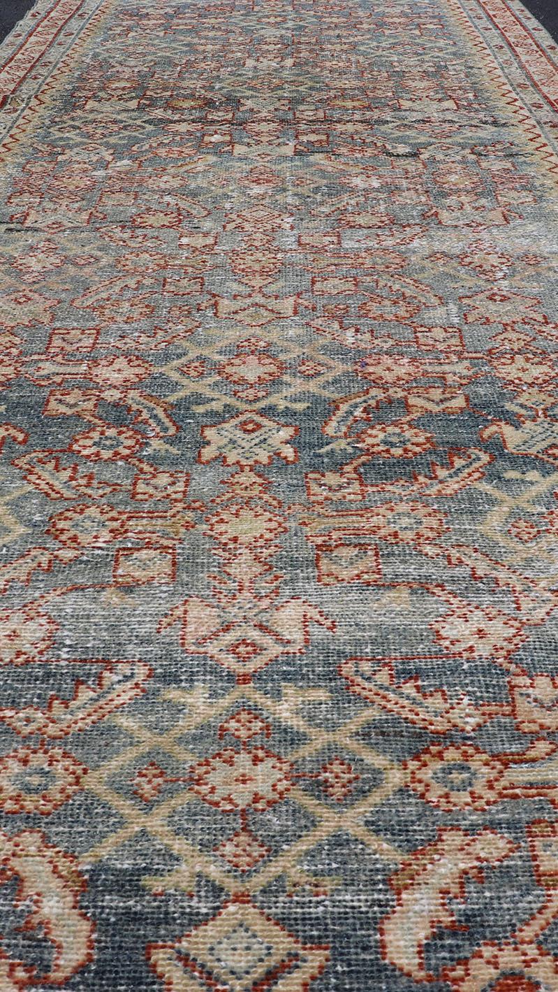 20th Century Distressed Antique Persian Malayer Gallery Runner with All-Over Design For Sale