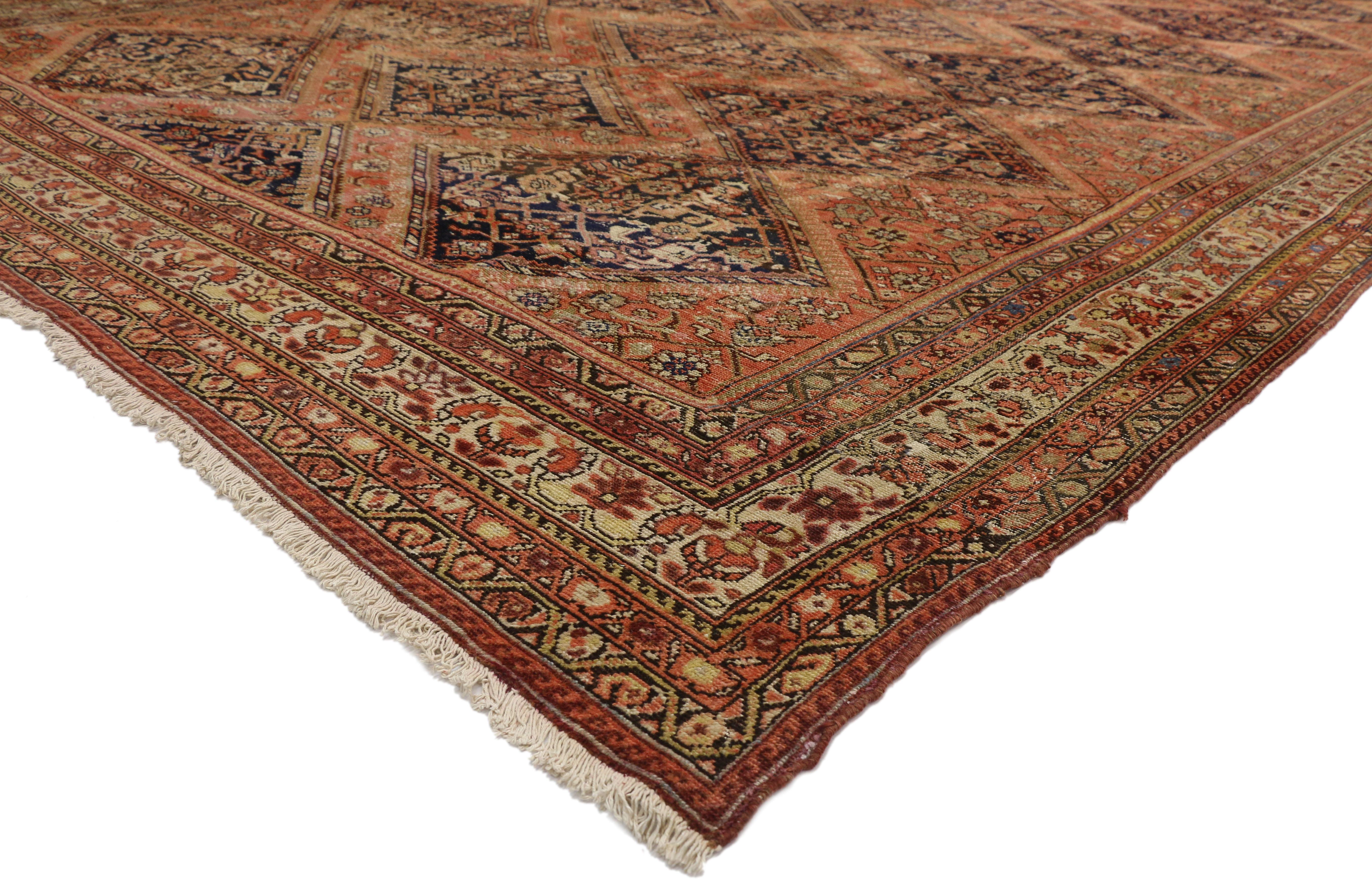 74262 Distressed Antique Persian Malayer Palace Rug with Rustic Artisan Elizabethan Style. An elaborate design of diamonds creates a mesmerizing sense of well-balanced proportions in this distressed antique Persian Malayer rug with modern industrial