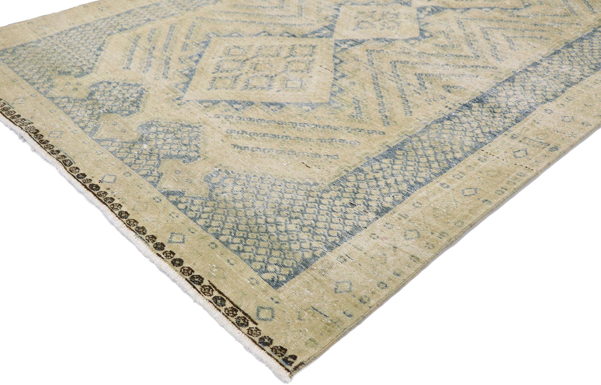 60831, distressed antique Persian Malayer rug with Rustic Coastal style. Balancing rustic sensibility and tribal style with antique washed colors, this hand knotted wool distressed antique Persian Malayer rug can beautifully blend modern,