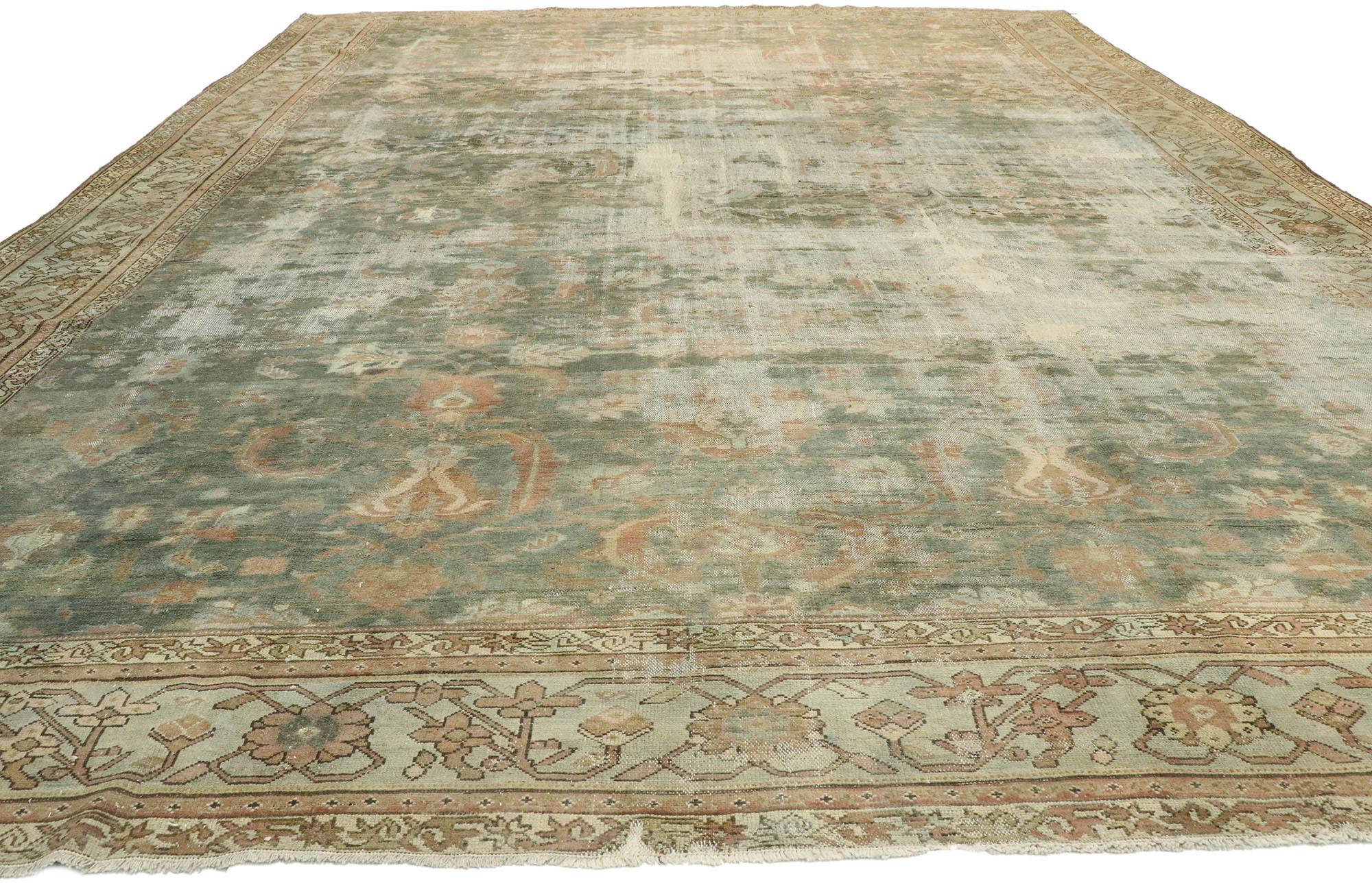 76708 Distressed Antique Persian Malayer rug 10’06 x 13’06. Lovingly timeworn with Gustavian grace, this hand knotted wool distressed antique Persian Malayer rug displays nostalgic charm and inimitable warmth. The weathered features features an