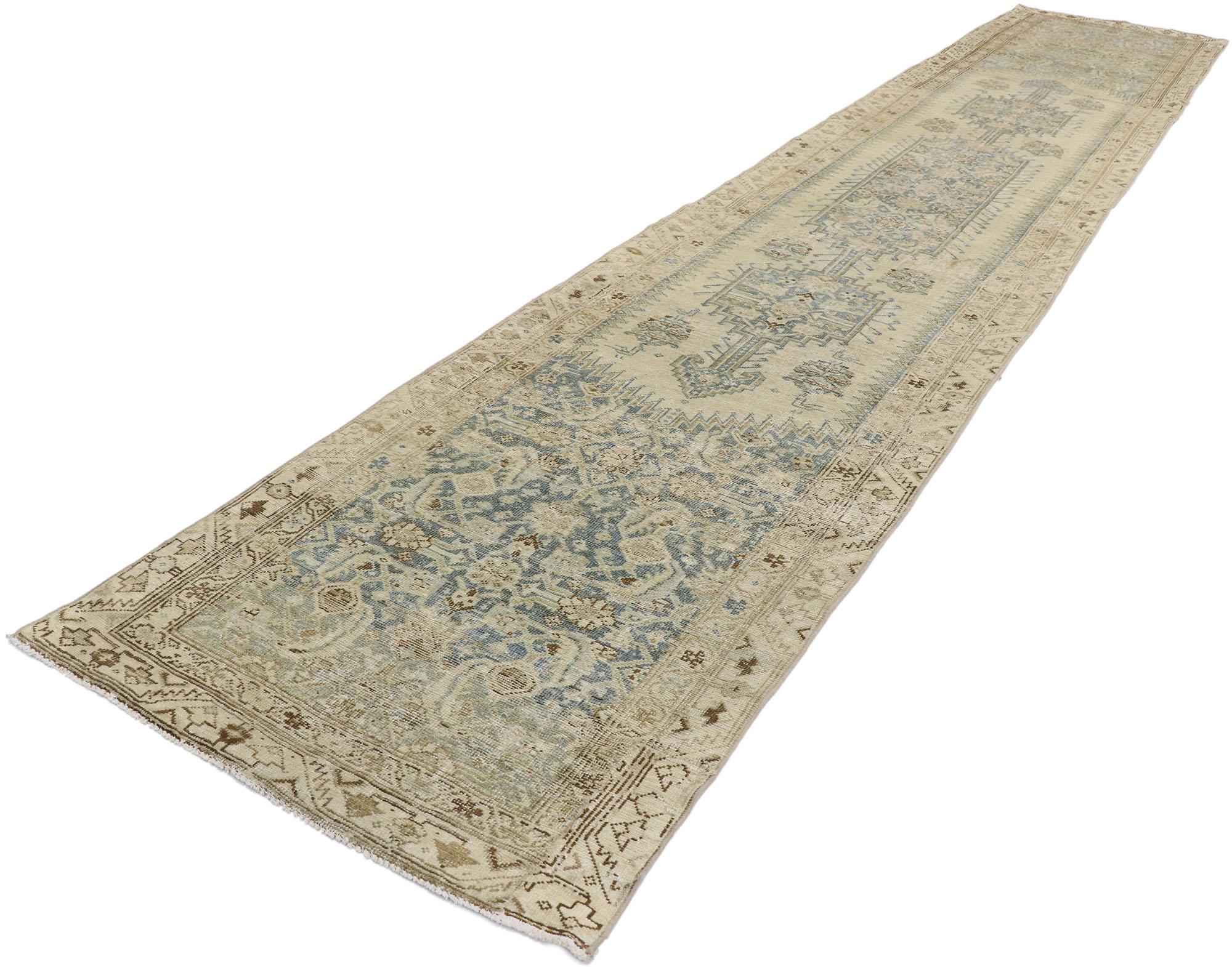 53240, distressed antique Persian Malayer Runner with French Provincial style and coastal colors. This hand knotted wool antique-washed antique Persian Malayer runner features a latch-hooked hexagonal medallion with palmette pendants floating on an