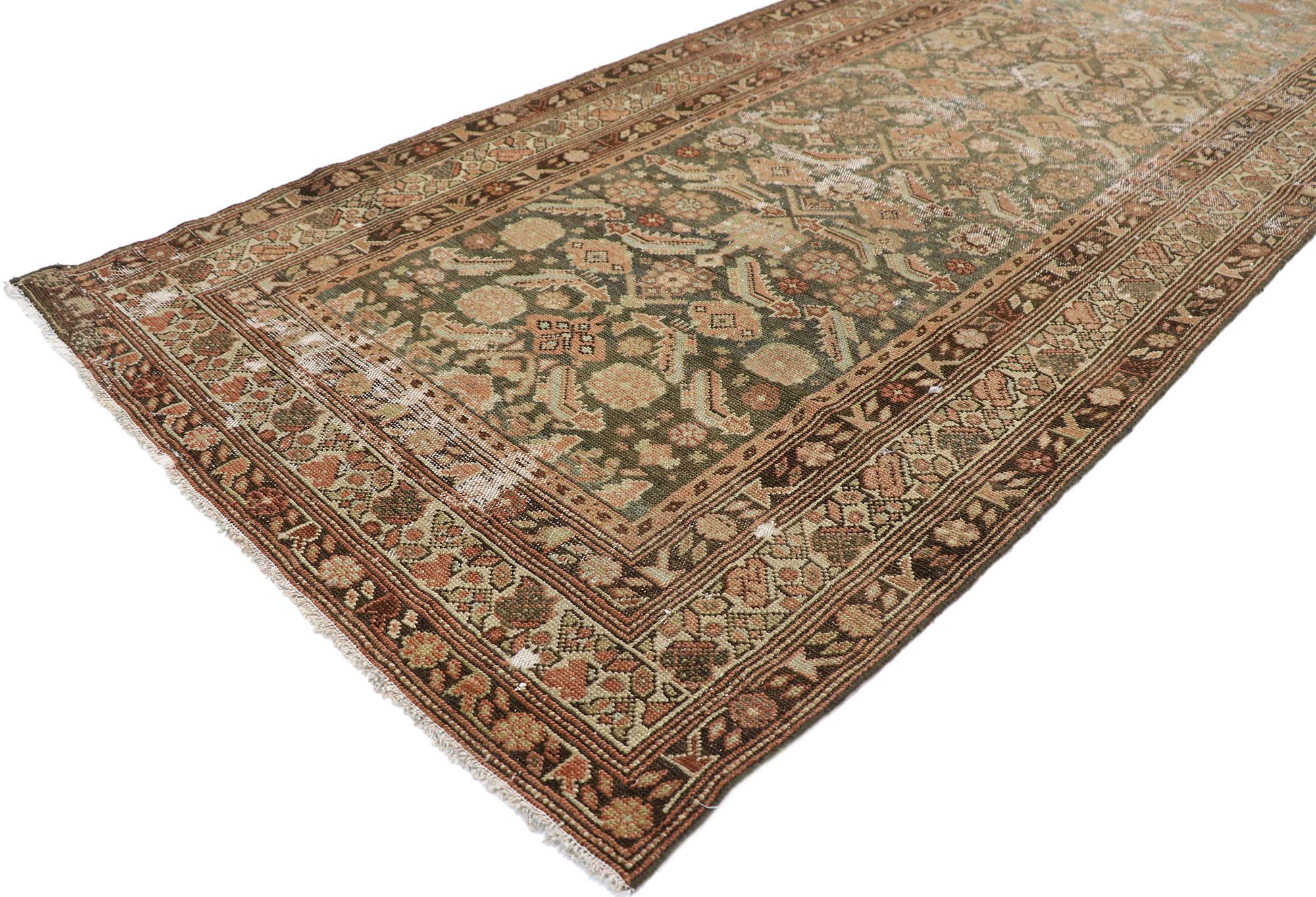 60840, distressed antique Persian Malayer runner with modern rustic industrial style 03'02 x 11'02. Warm and inviting with rustic sensibility, this hand-knotted wool distressed antique Persian Malayer runner features an all-over Herati pattern. The