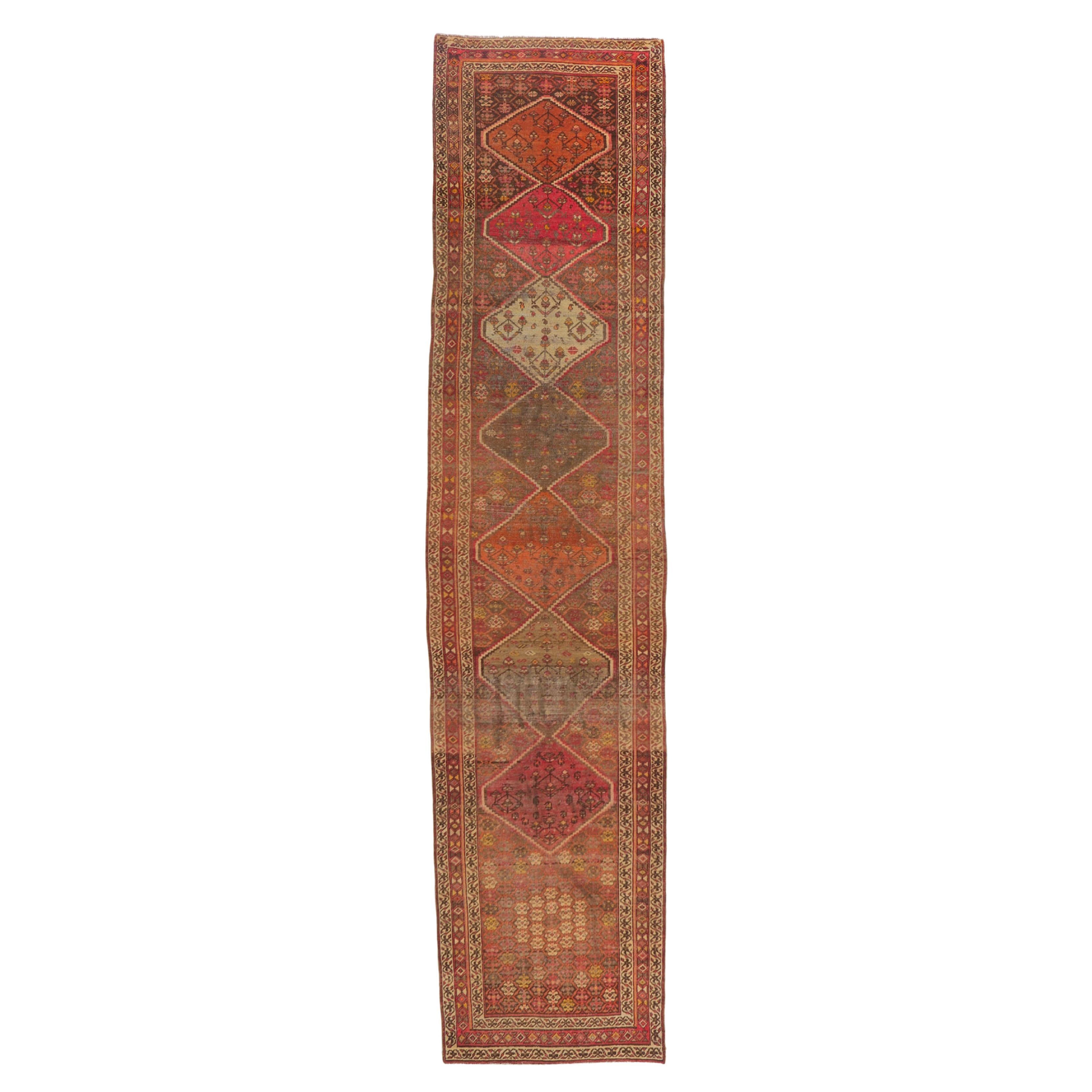 Distressed Antique Persian Malayer Runner with Tribal Style For Sale