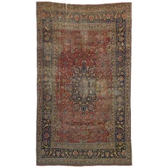 Distressed Antique Persian Mashhad Gallery Rug with Rustic Artisan Style