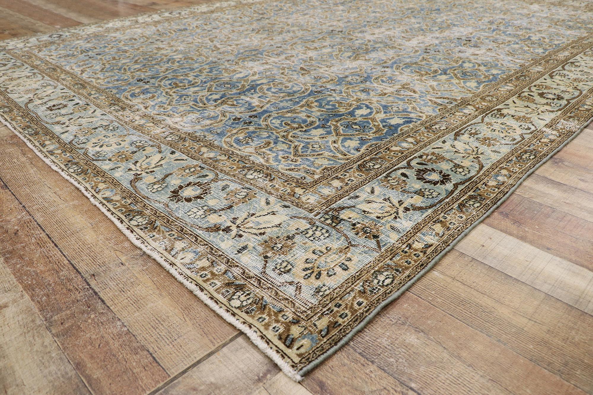 Distressed Antique Persian Mashhad Rug  In Distressed Condition For Sale In Dallas, TX
