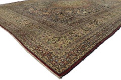 Distressed Antique Persian Mashhad Rug with Garden Design and English Style