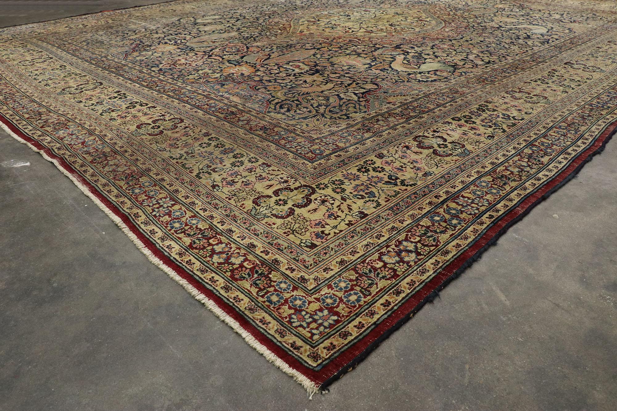 20th Century Distressed Antique Persian Mashhad Rug with Garden Design and English Style For Sale