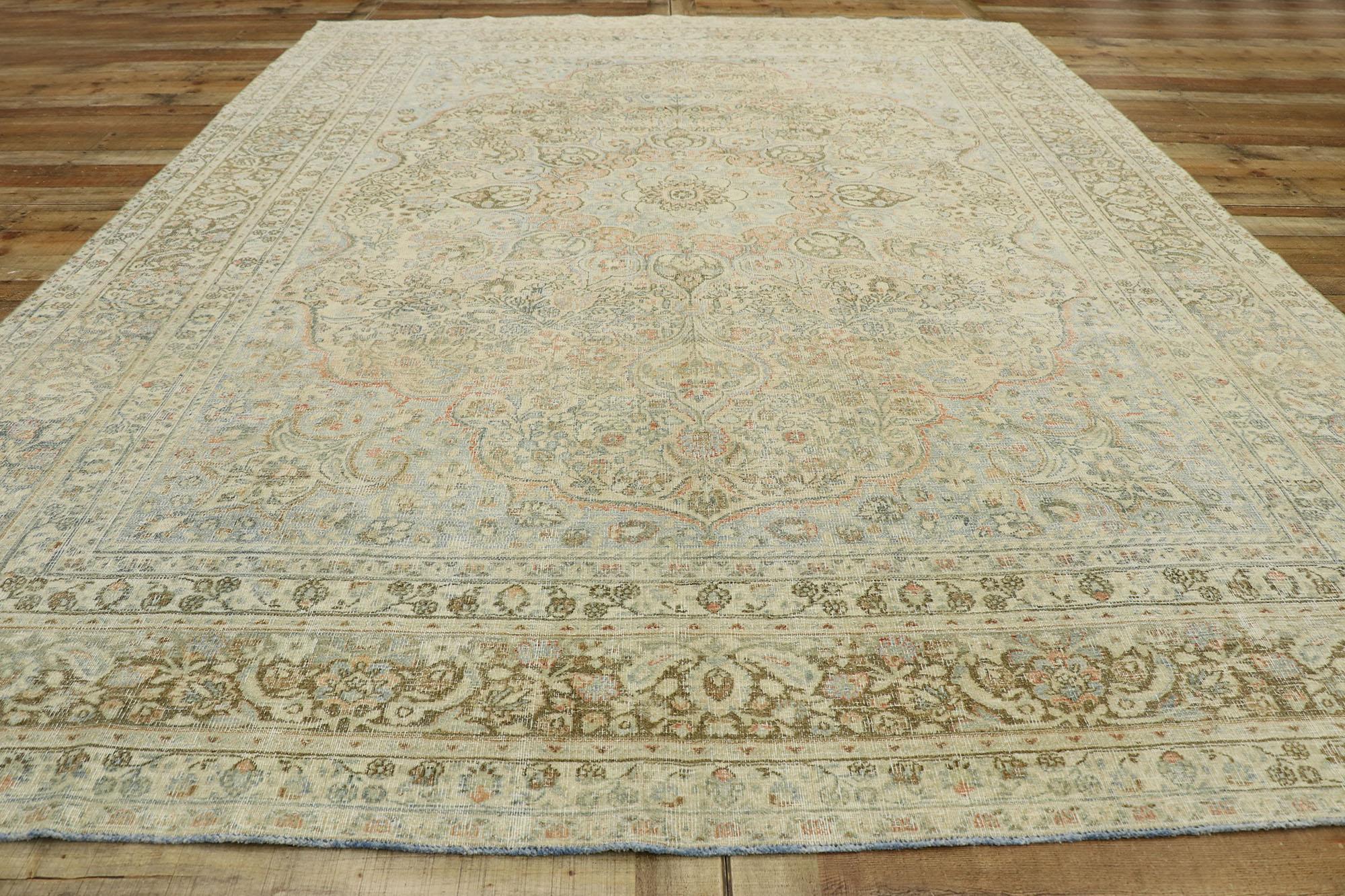 20th Century Distressed Antique Persian Mashhad Rug with Modern Rustic Cotswold Cottage Style For Sale