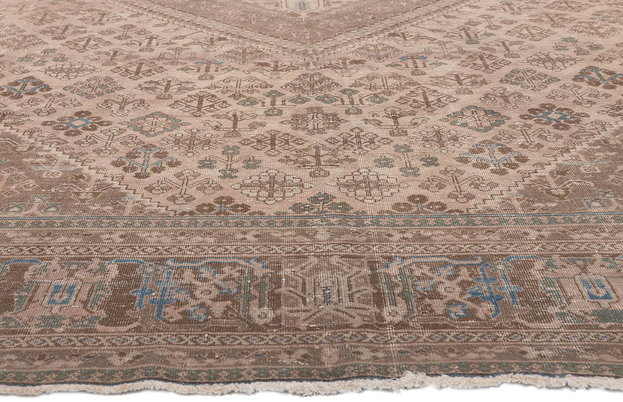 Rustic Distressed Antique Persian Rug, Understated Elegance Meets Relaxed Familiarity For Sale