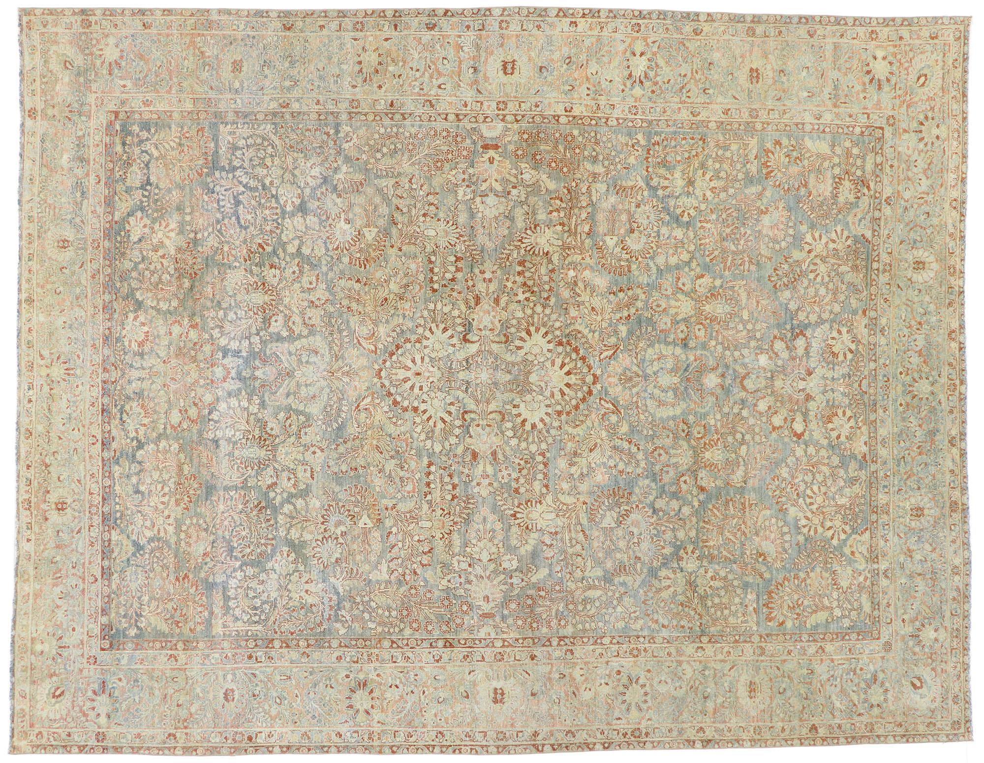 53481 Distressed Antique Persian Sarouk rug with Rustic Italian Style 08'10 x 11'03. Emanating Italian Rustic style and lovingly timeworn appearance combined with brilliant blues and warm orange hues inspired by Italy, this hand knotted wool