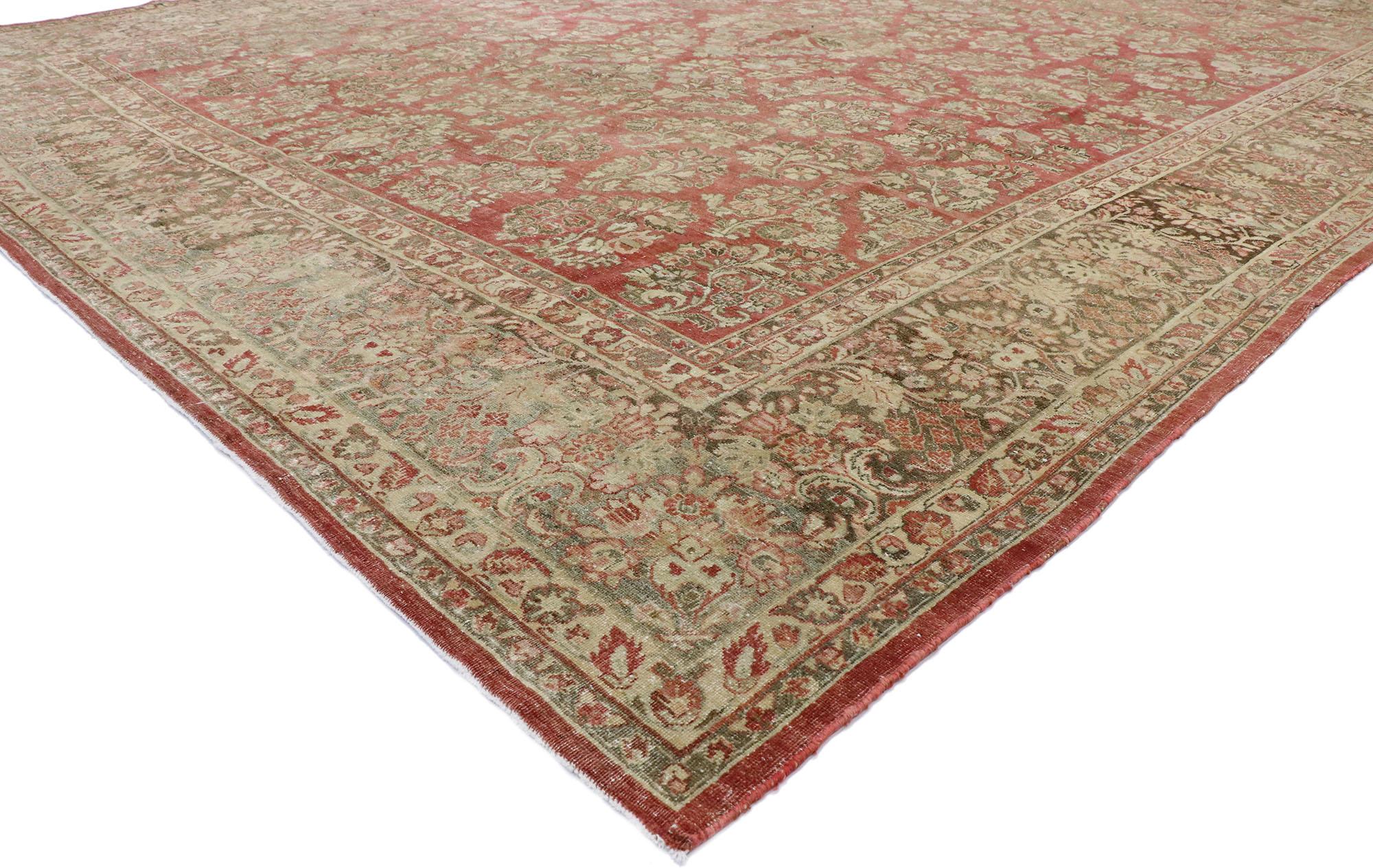 53445, distressed antique Persian Sarouk rug with rustic American traditional style. With timeless appeal, soft colors, and naturalistic design elements, this hand knotted wool distressed antique Persian Sarouk rug can beautifully blend modern,