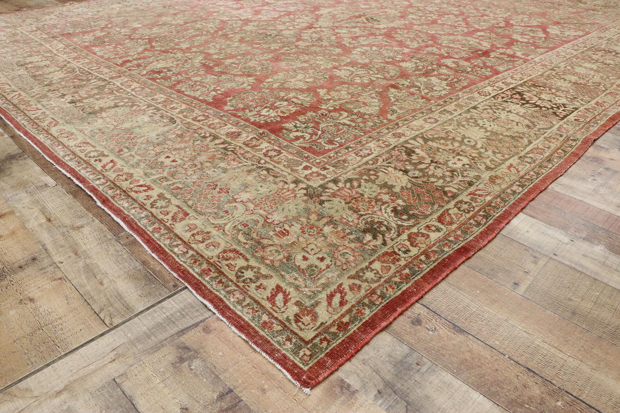 20th Century Distressed Antique Persian Sarouk Rug with Rustic American Traditional Style For Sale