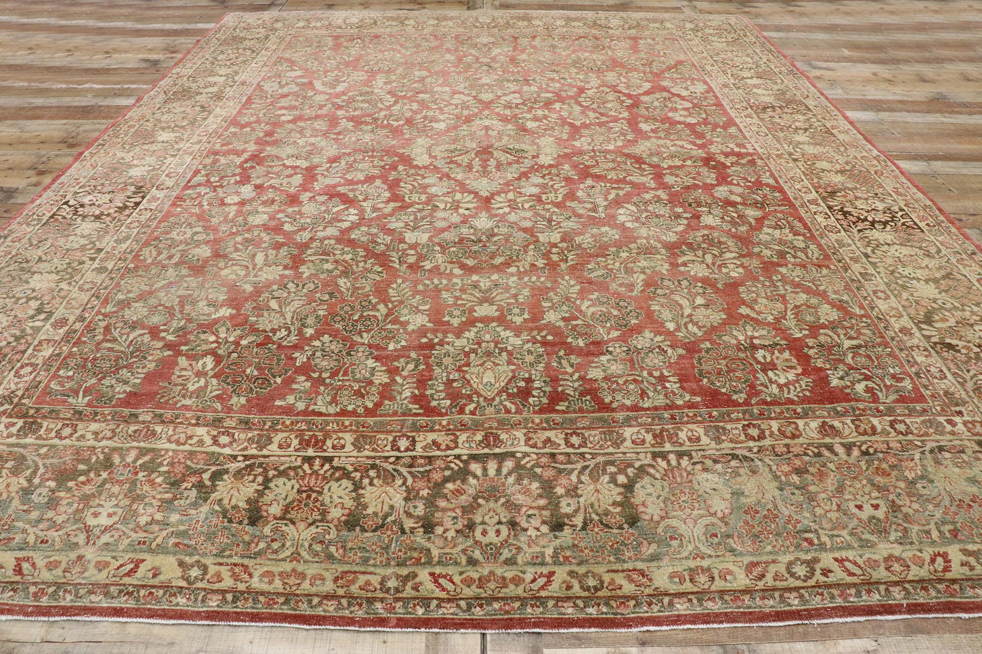 Wool Distressed Antique Persian Sarouk Rug with Rustic American Traditional Style For Sale