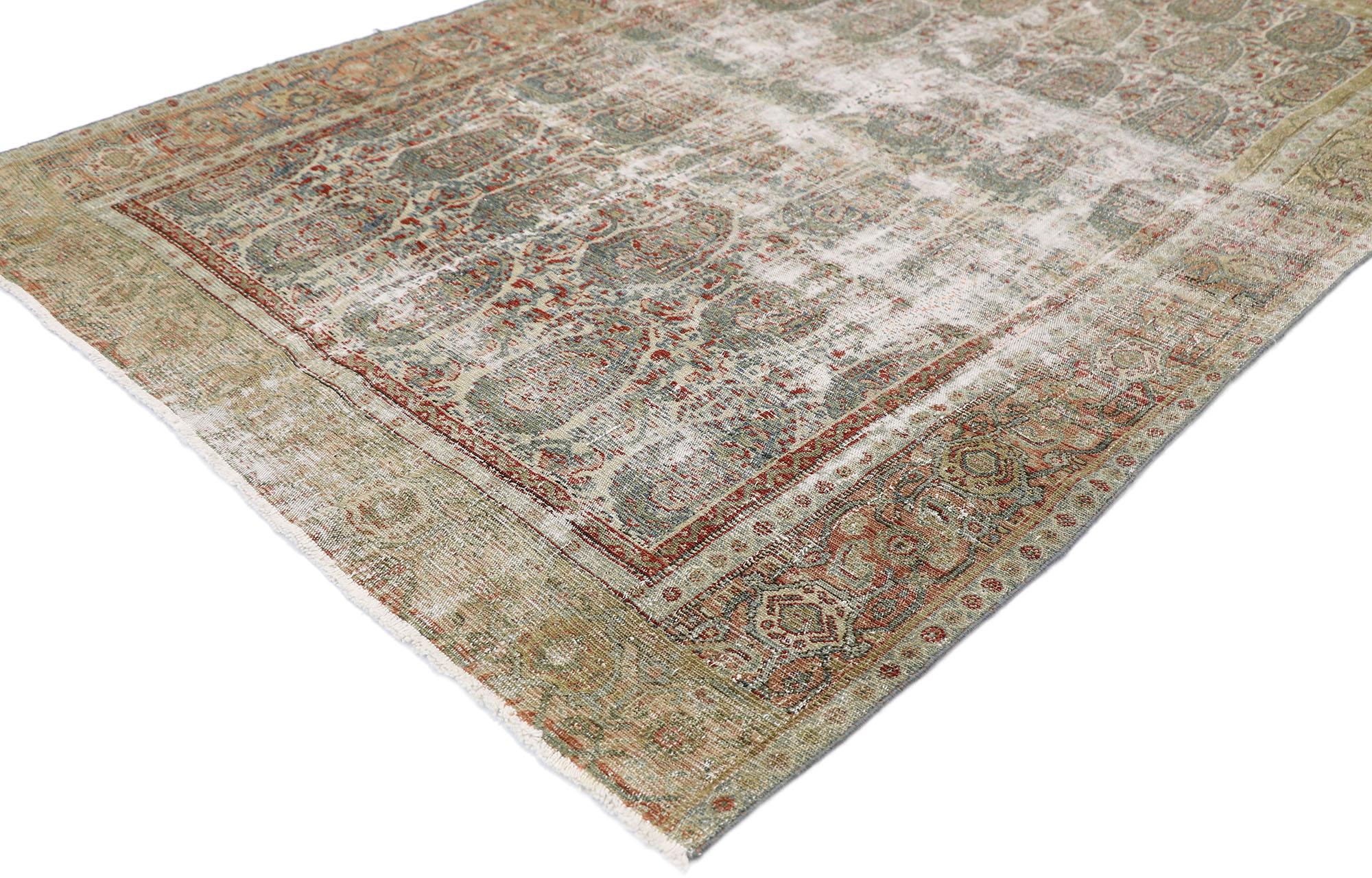 60818, distressed antique Persian Senneh Boteh Rug with Rustic Arts & Crafts style 04'01 x 06'04. Cleverly composed and distinctively well-balanced, this hand knotted wool distressed antique Persian Senneh boteh rug will take on a curated lived-in
