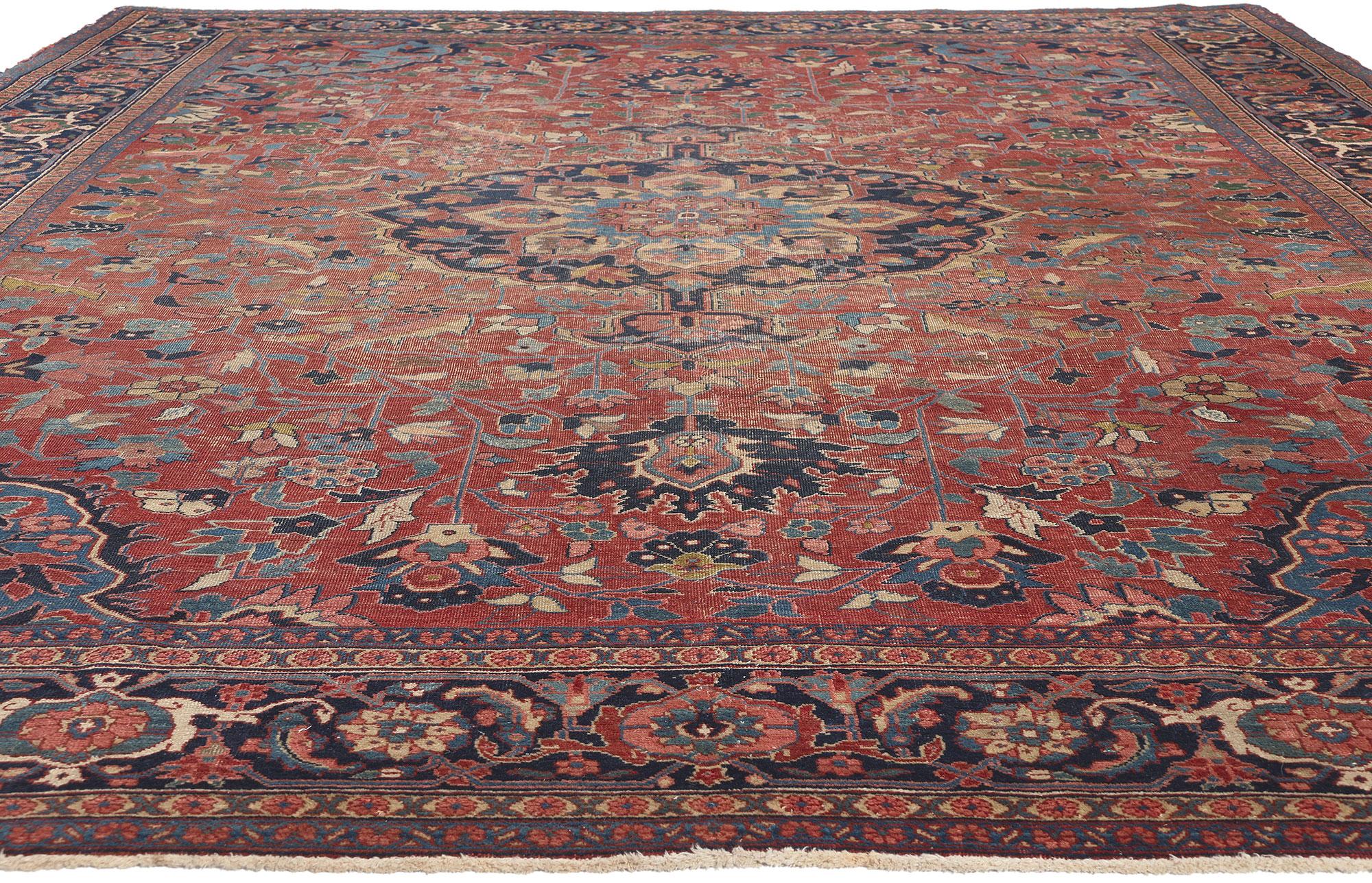 Hand-Knotted Distressed Antique Persian Serapi Rug For Sale