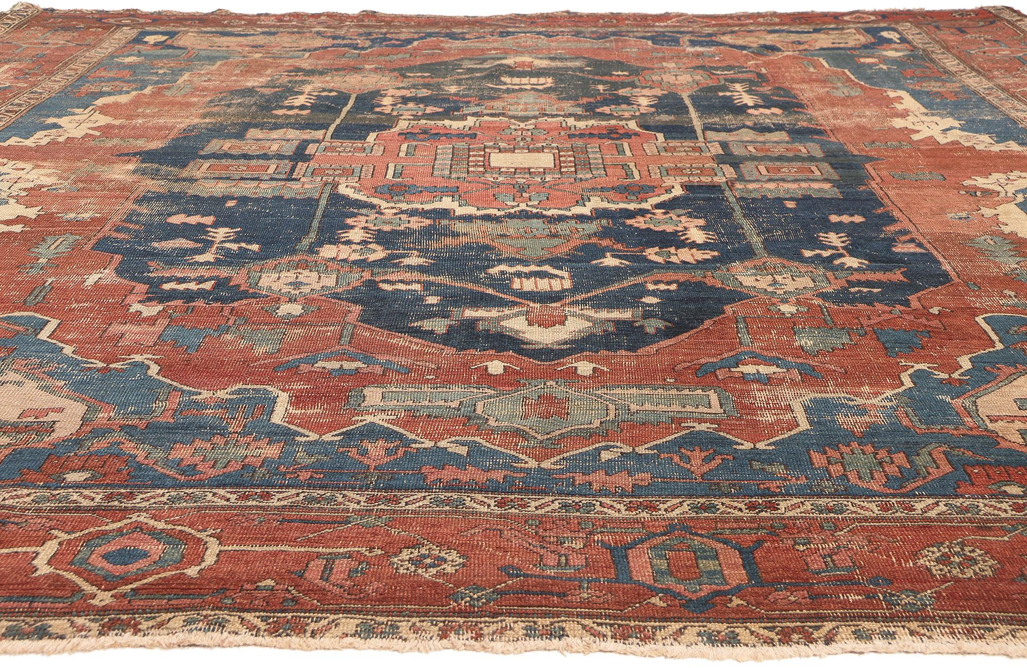 19th Century Distressed Antique Persian Serapi Rug, Rugged Beauty Meets Weathered Charm For Sale