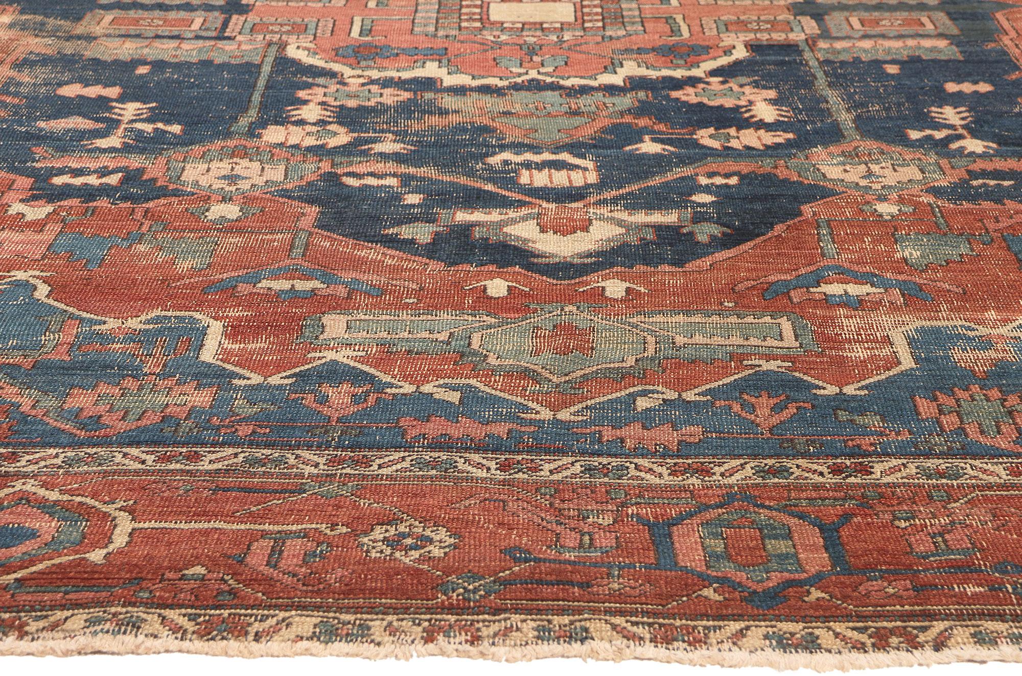Distressed Antique Persian Serapi Rug, Rugged Beauty Meets Weathered Charm For Sale 1