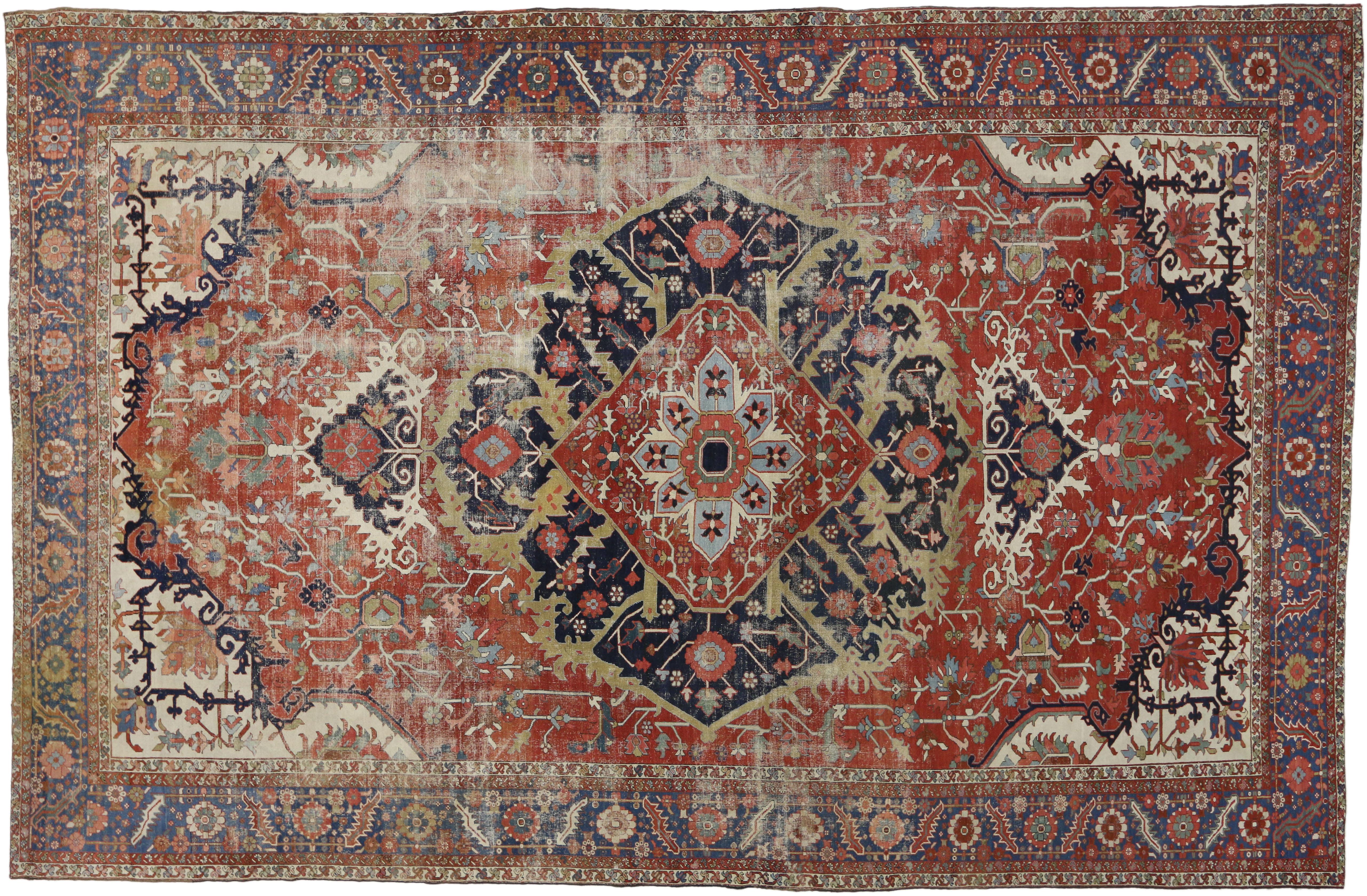 Wool Antique-Worn Persian Serapi Rug, Rustic Charm Meets Relaxed Refinement For Sale