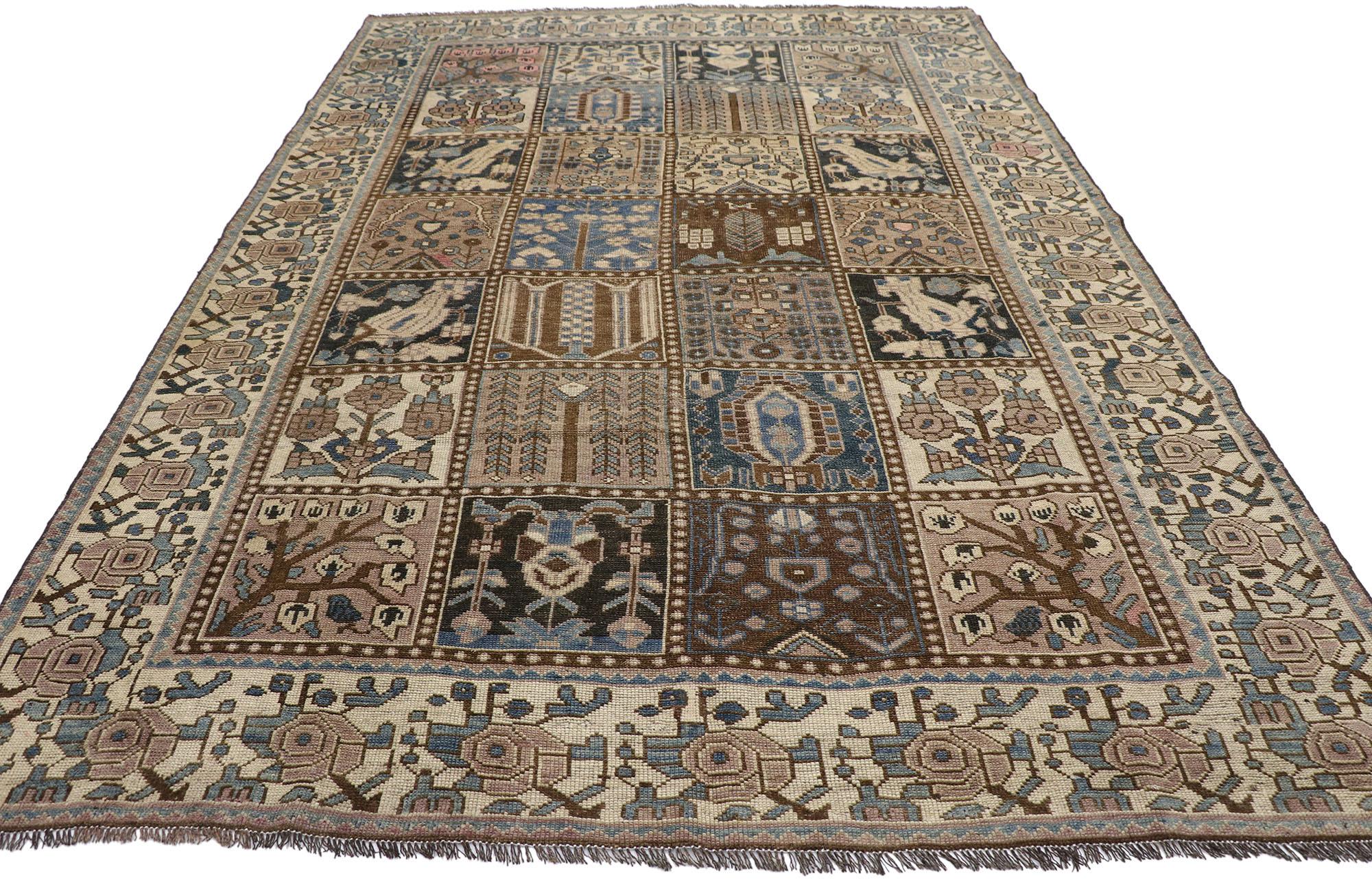 Industrial Distressed Antique Persian Shiraz Rug with Garden Panel Four Seasons Design For Sale